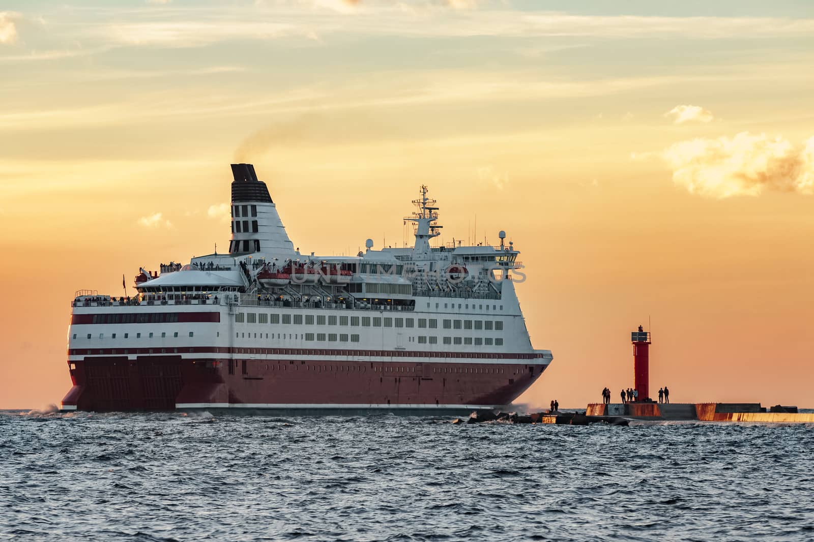 Red cruise liner. Passenger ferry sailing from Riga to Stockholm