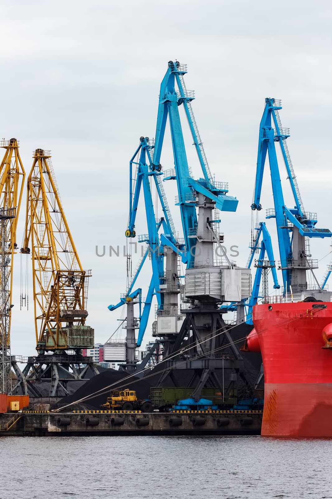 Blue cargo cranes in the port of Riga, Europe