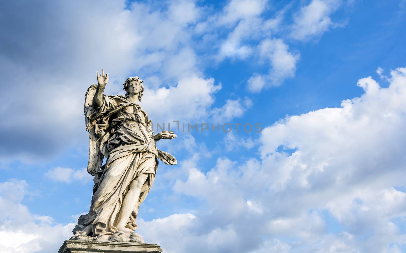 Statue of Angel with the Nails on Ponte Sant'Angelo in Rome. Every statue of angel on the bridge bears the instruments of Christ's passion and were executed by Bernini's students