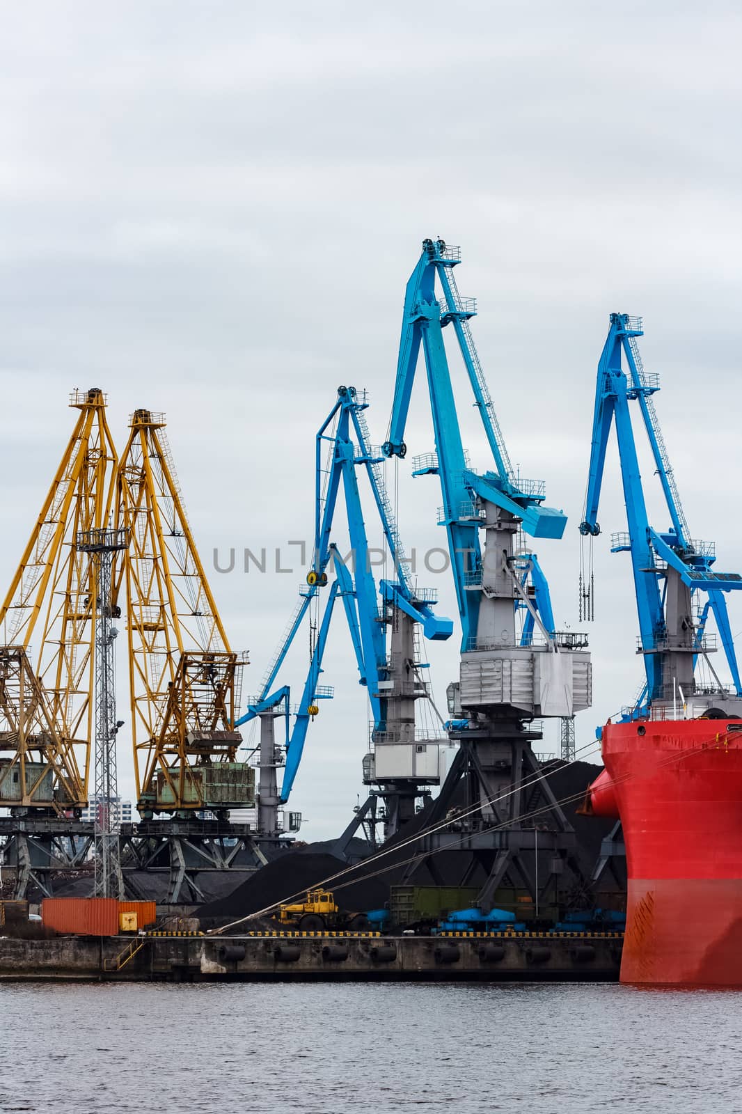 Blue cargo cranes in the port of Riga, Europe