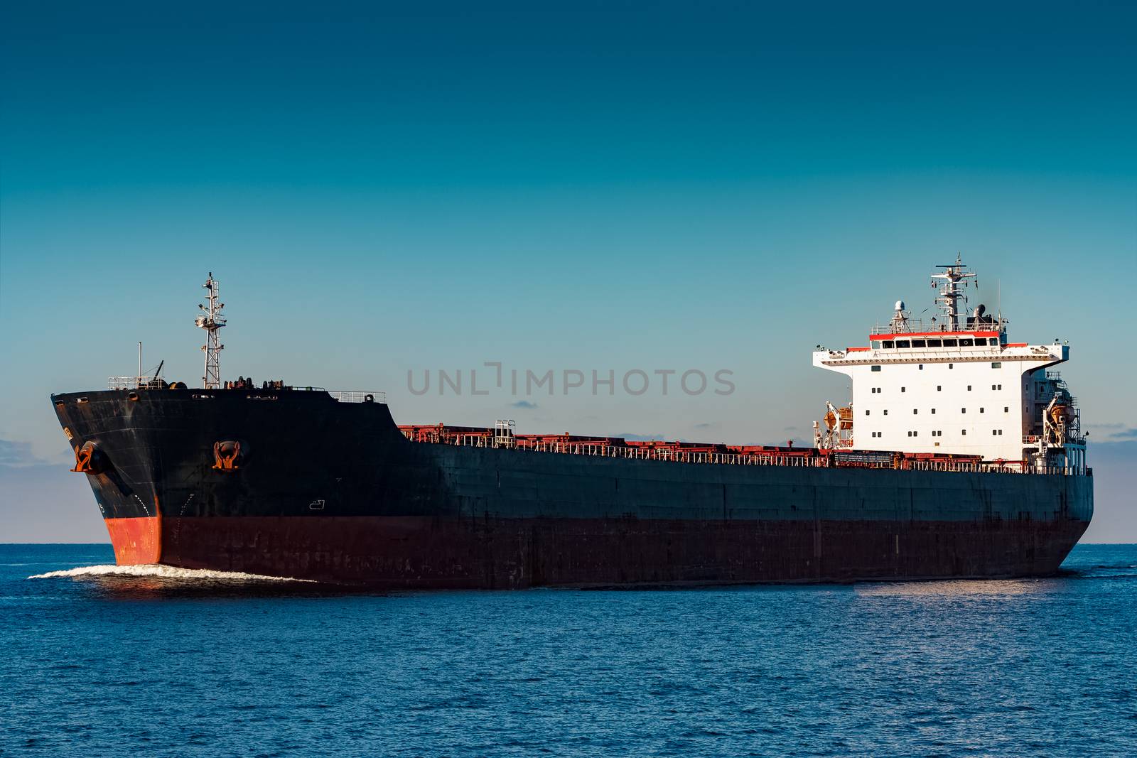 Black cargo ship by sengnsp