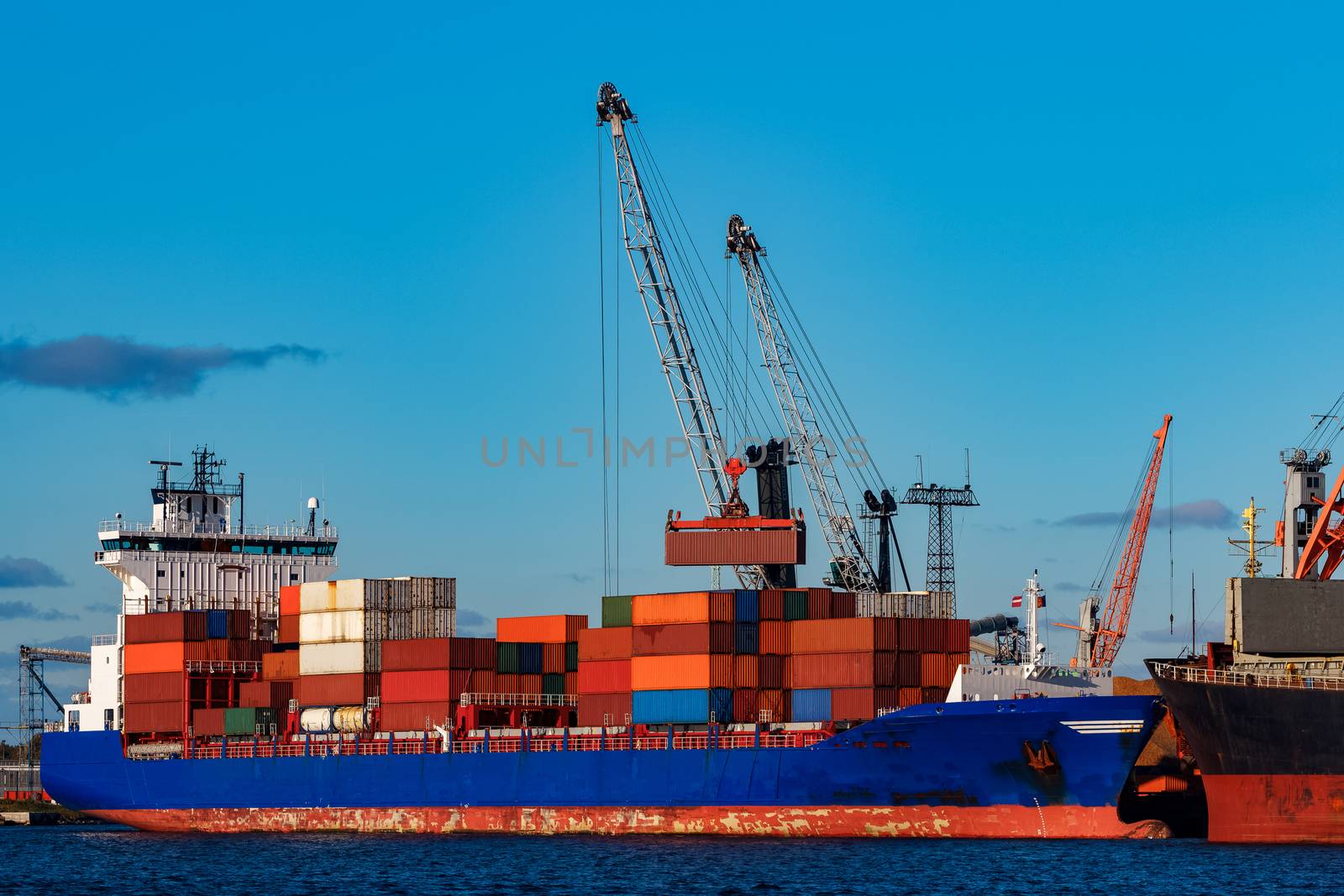 Blue container ship loading by sengnsp