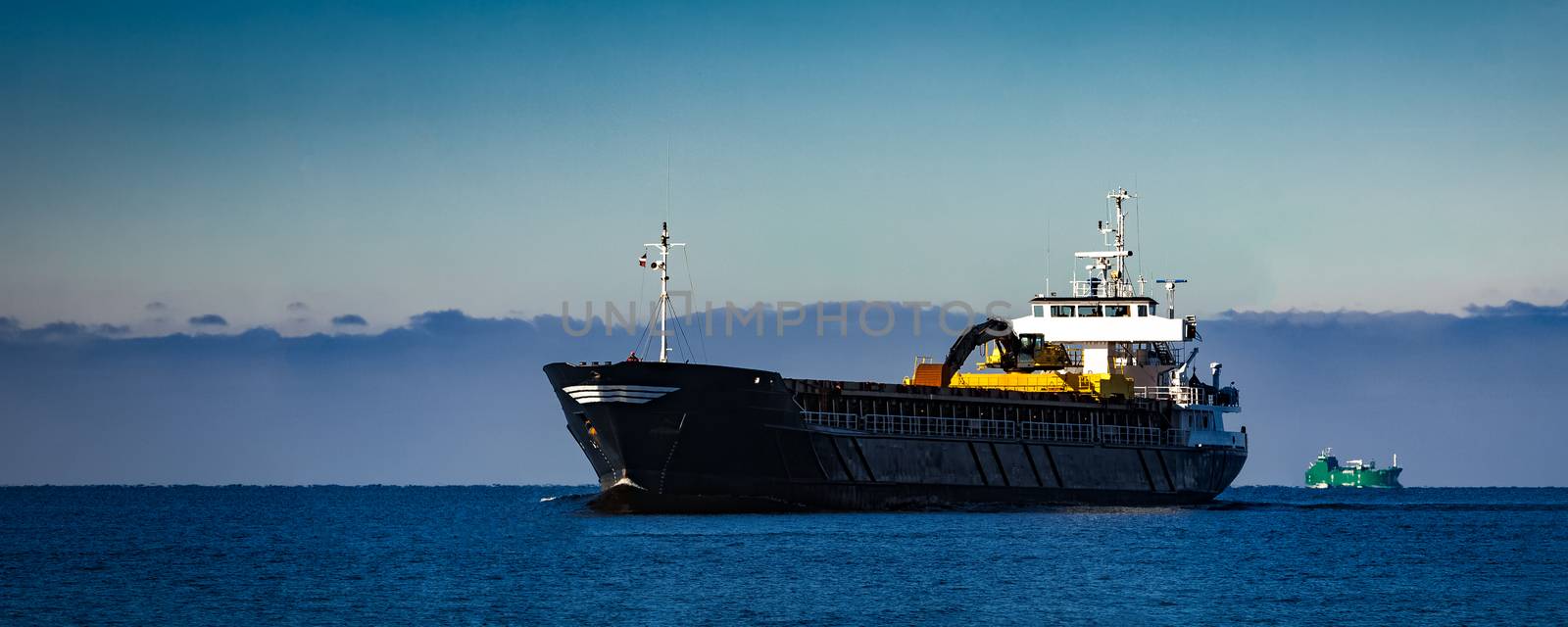 Black cargo ship by sengnsp