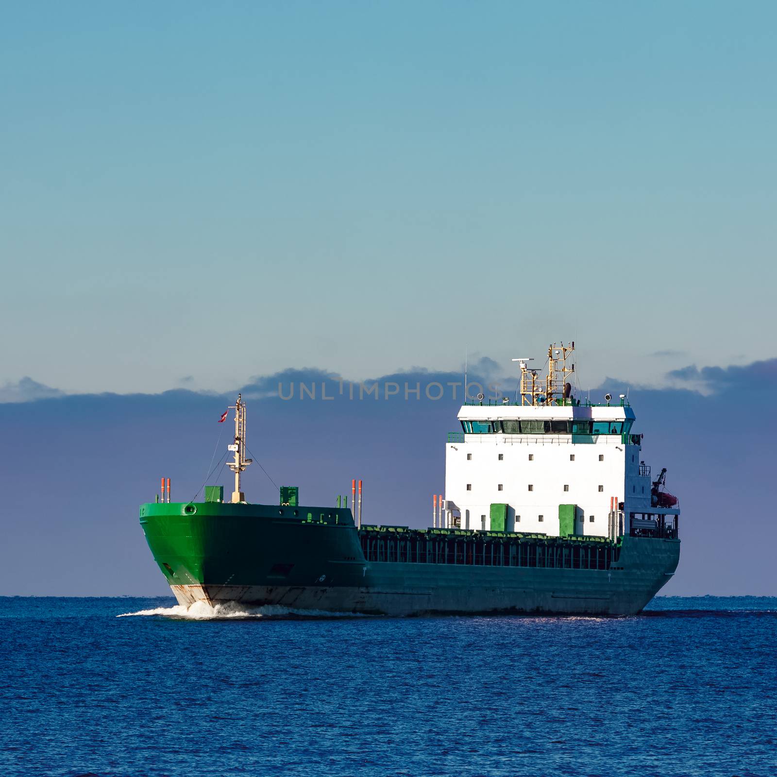 Green cargo ship by sengnsp