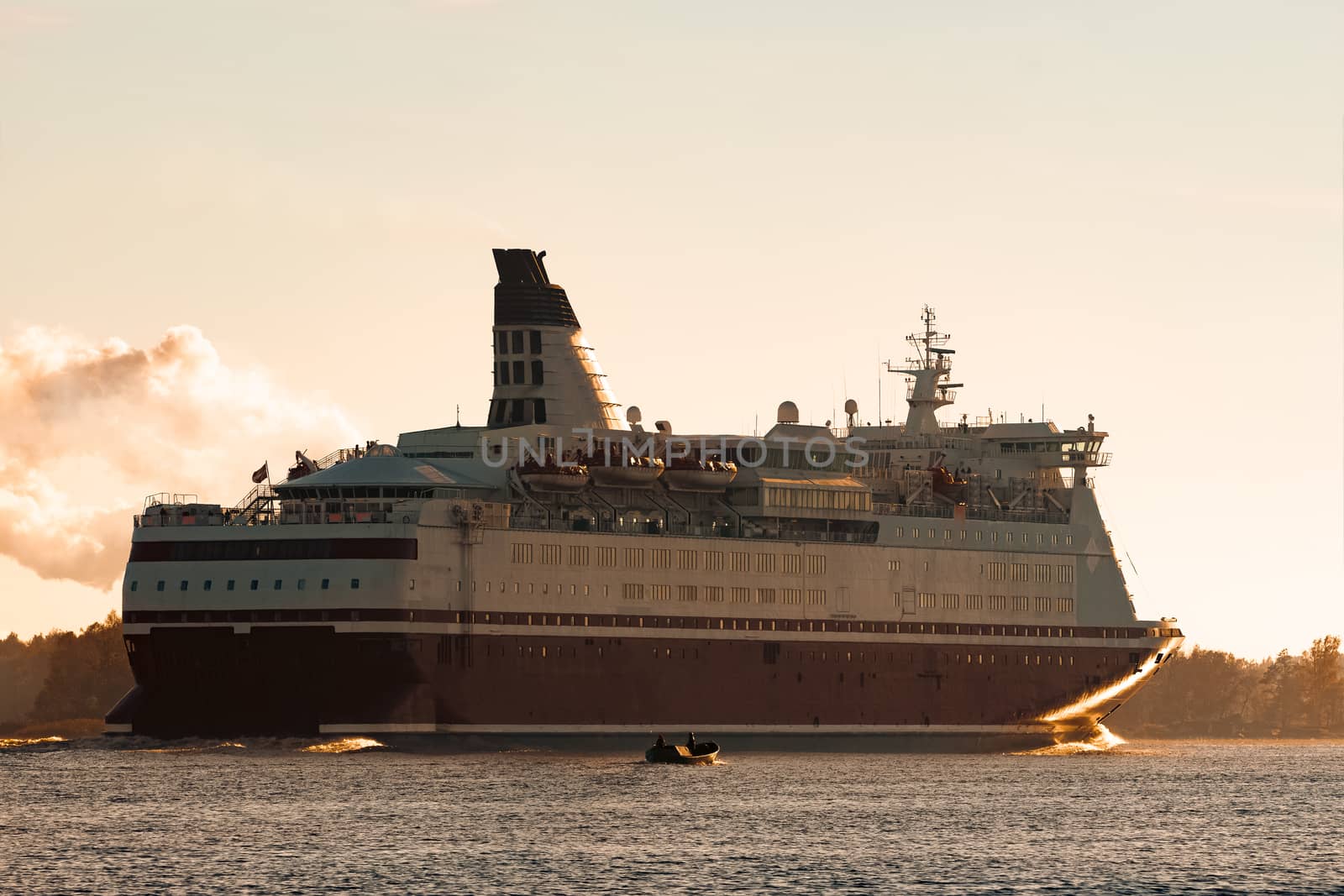 Big cruise liner. Passenger ferry ship entering Riga at morning