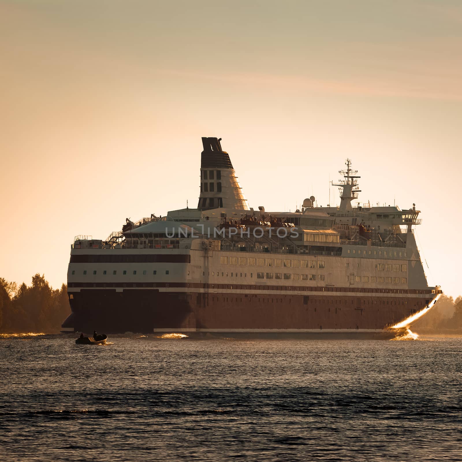 Big cruise liner. Passenger ferry ship entering Riga at morning