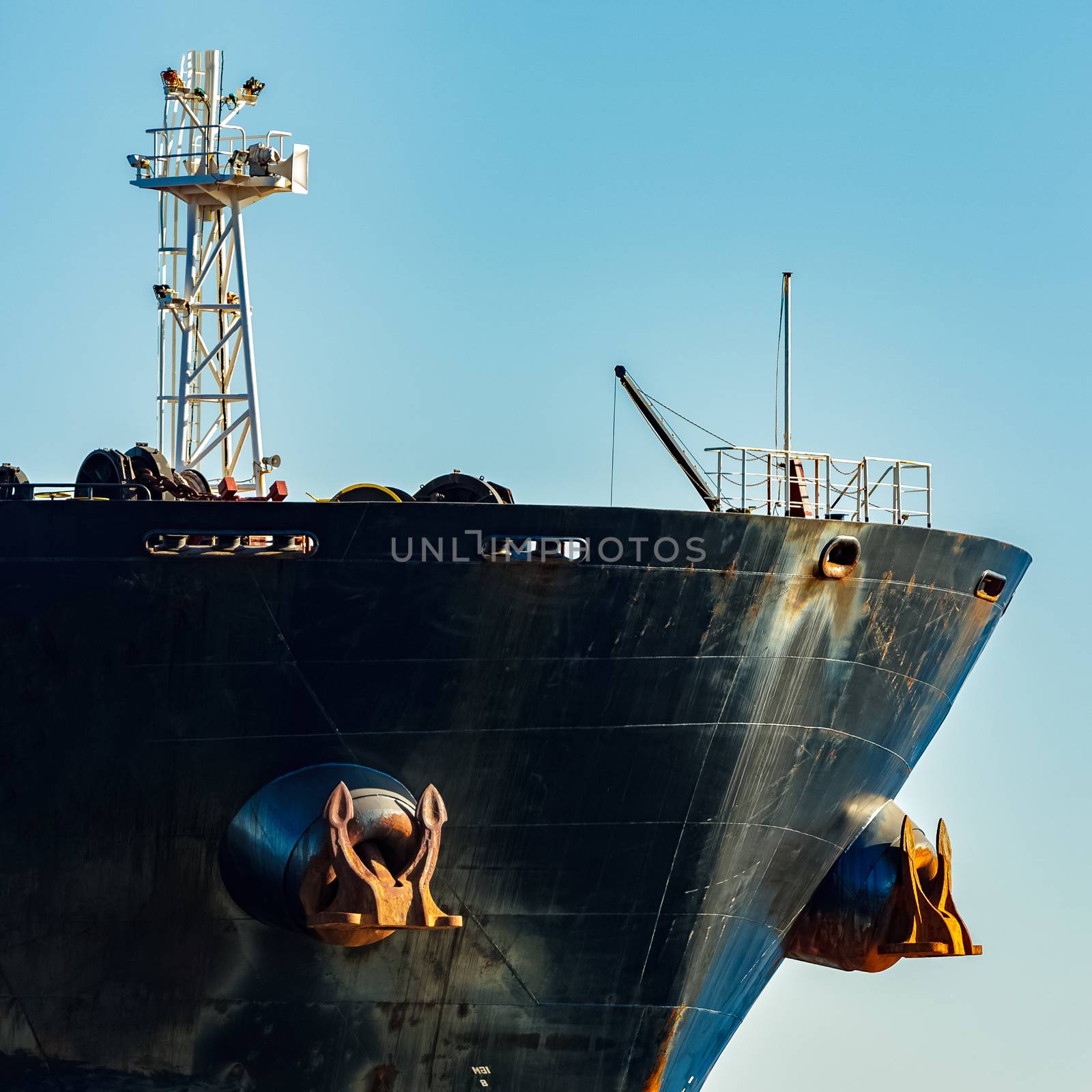 Black cargo ship's bow by sengnsp