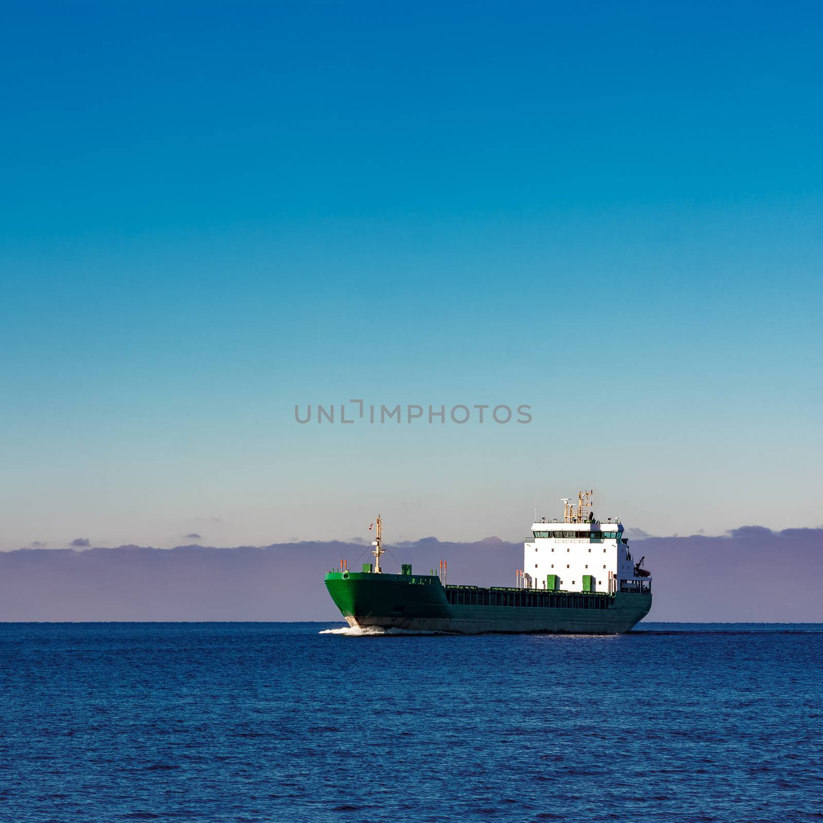 Green cargo ship by sengnsp