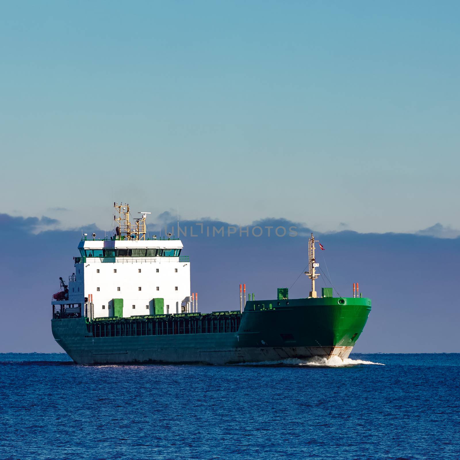 Green cargo ship by sengnsp