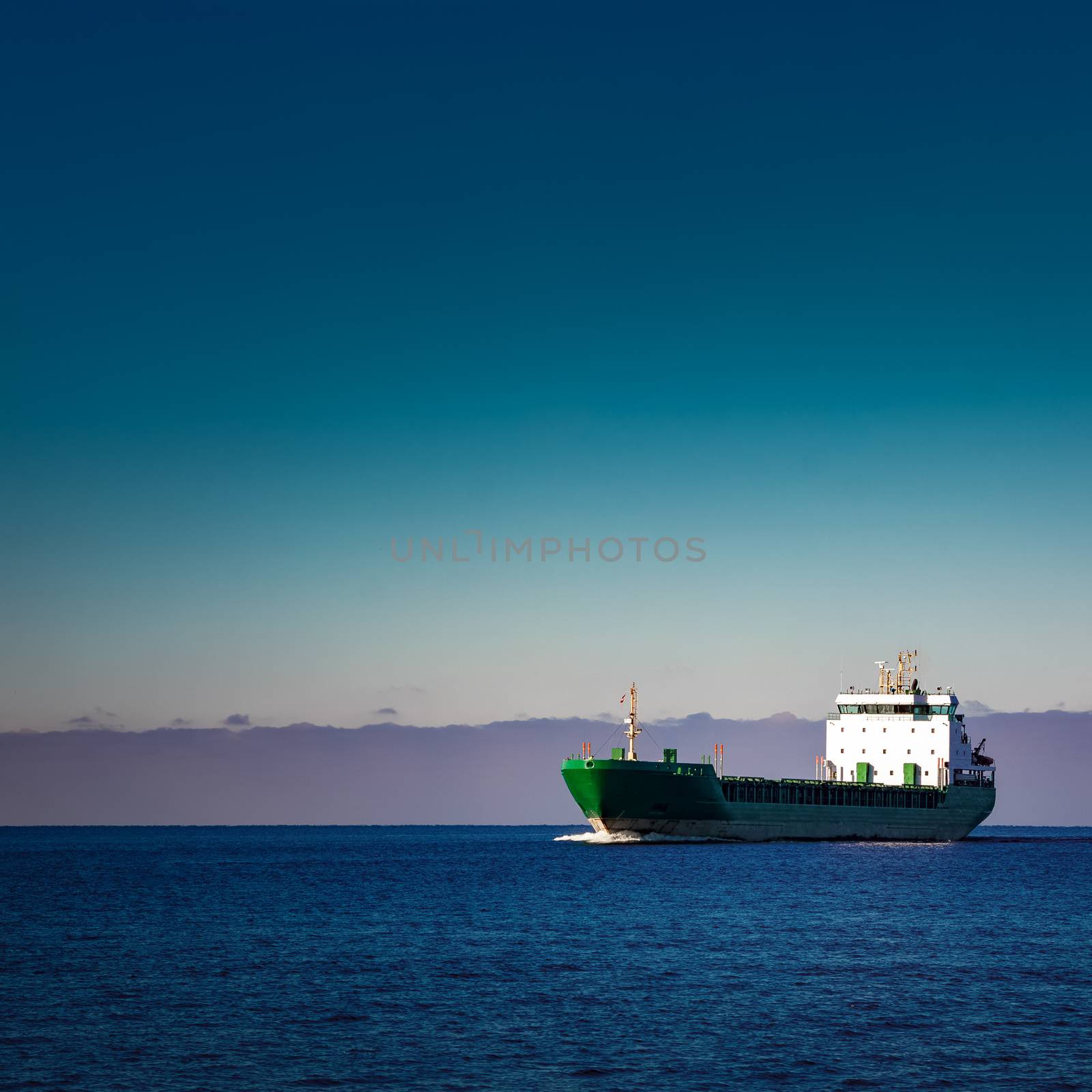 Green cargo ship by sengnsp