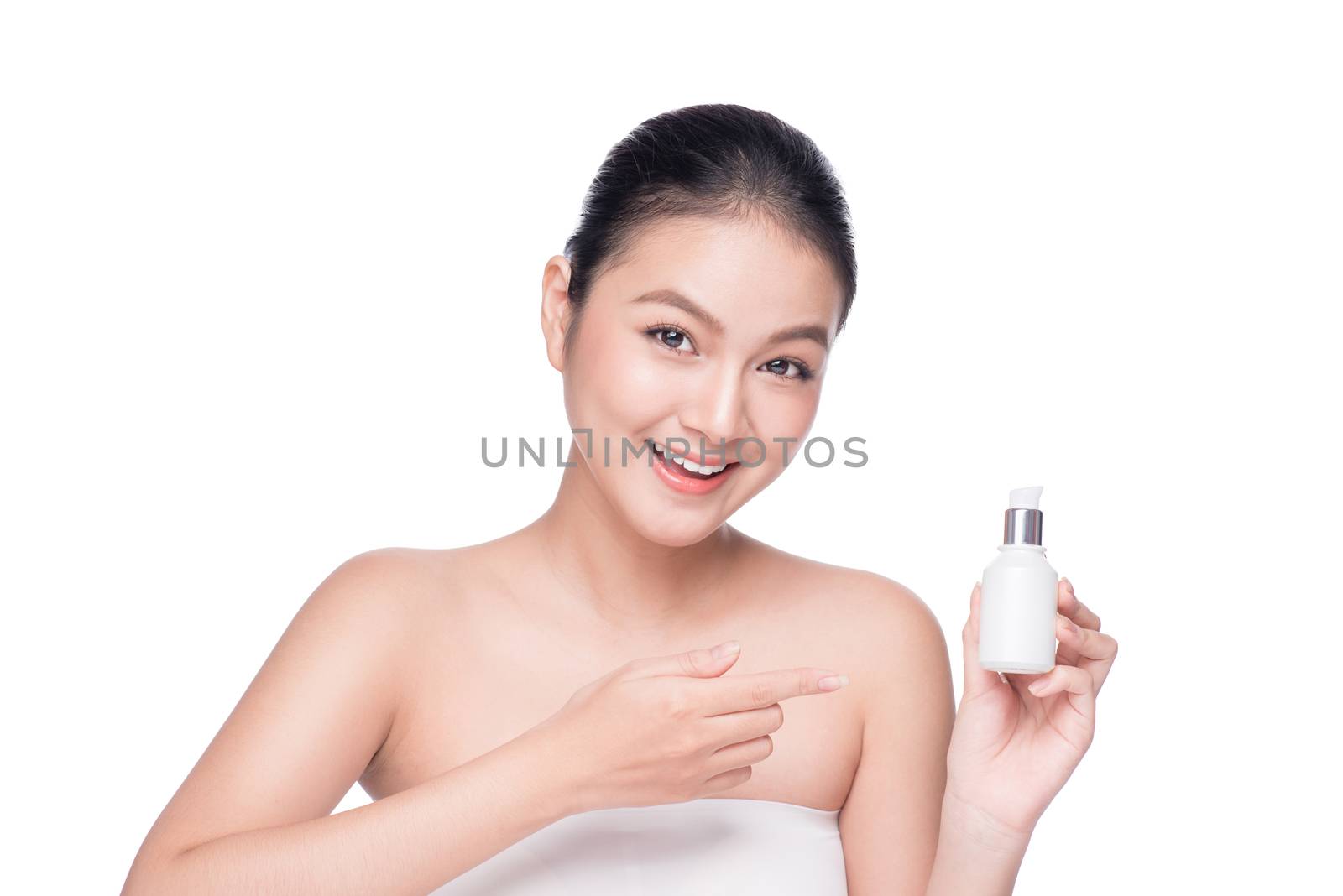 Beauty treatment. Asian woman holding serum treatment bottle by makidotvn