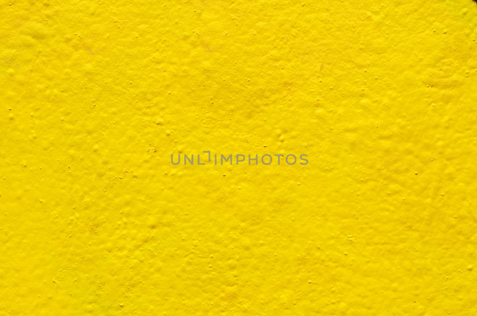 Yellow background image on the cement wall