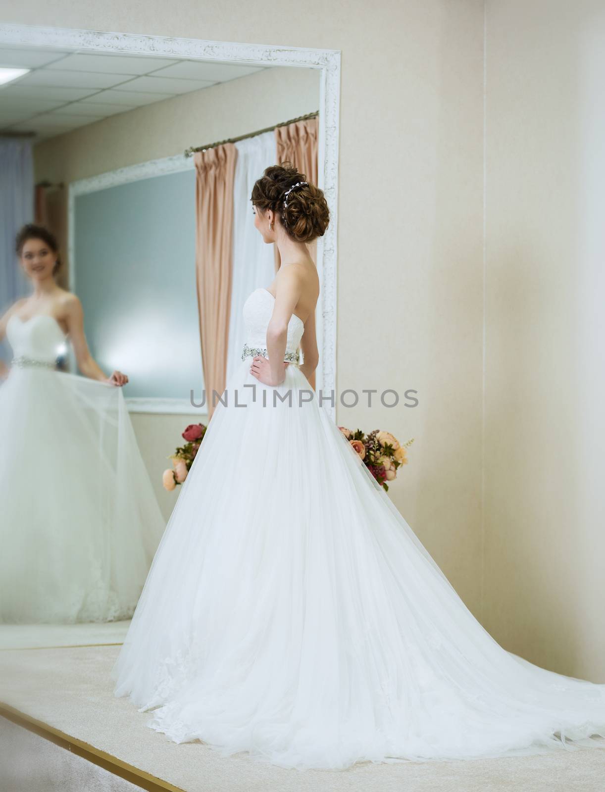 Beautiful young bride in front of the mirror. Portrait with wedd by Draw05