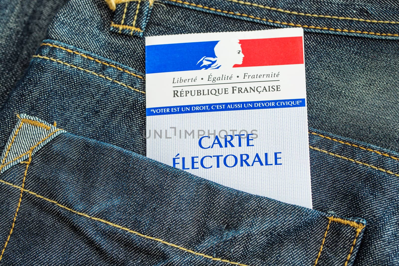 French electoral card in the rear pocket of a jeans, 2017 presidential and legislative elections concept