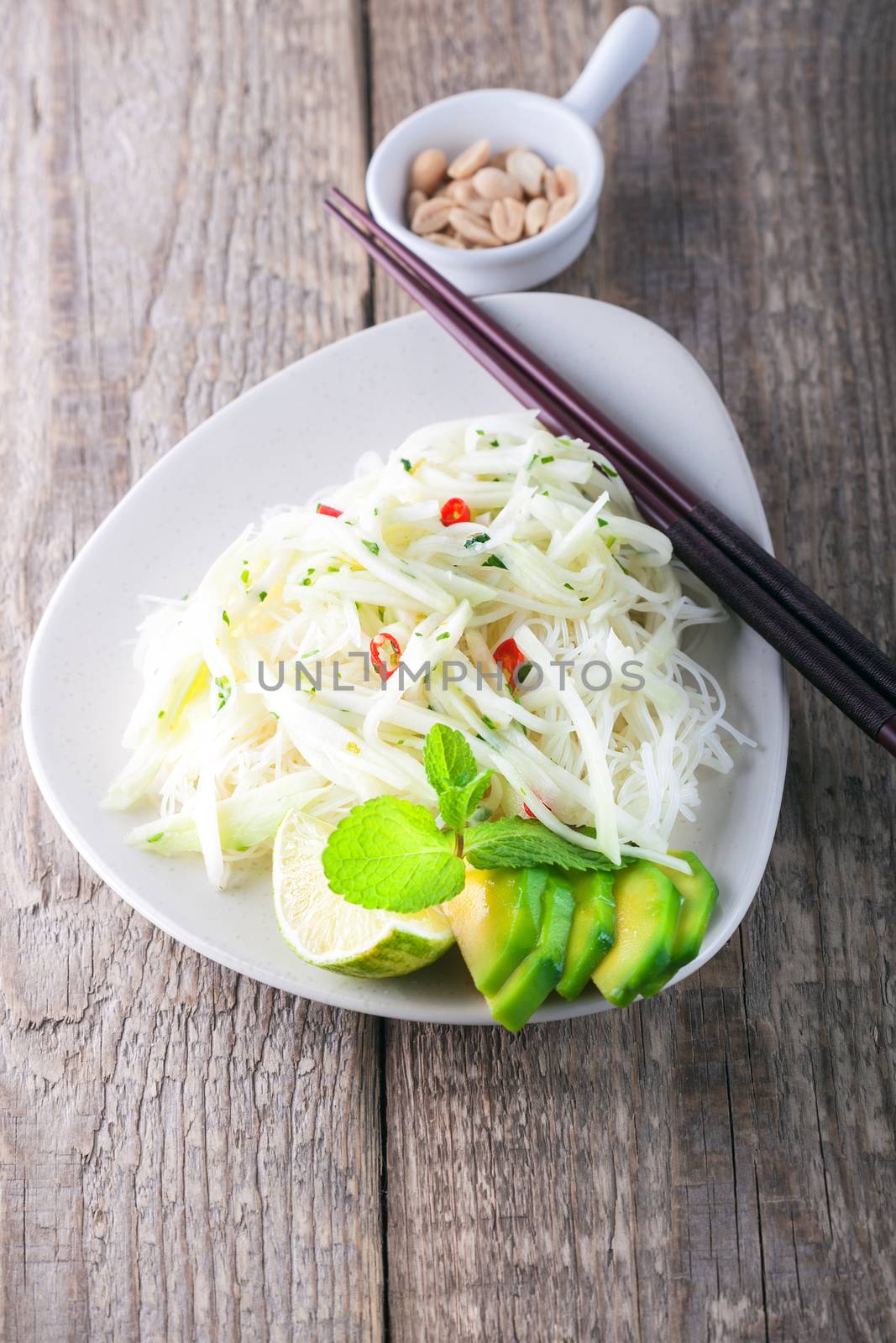 Spicy kohlrabi noodles, dressing: fish sauce, vinegar rices, lime garlic and ginger