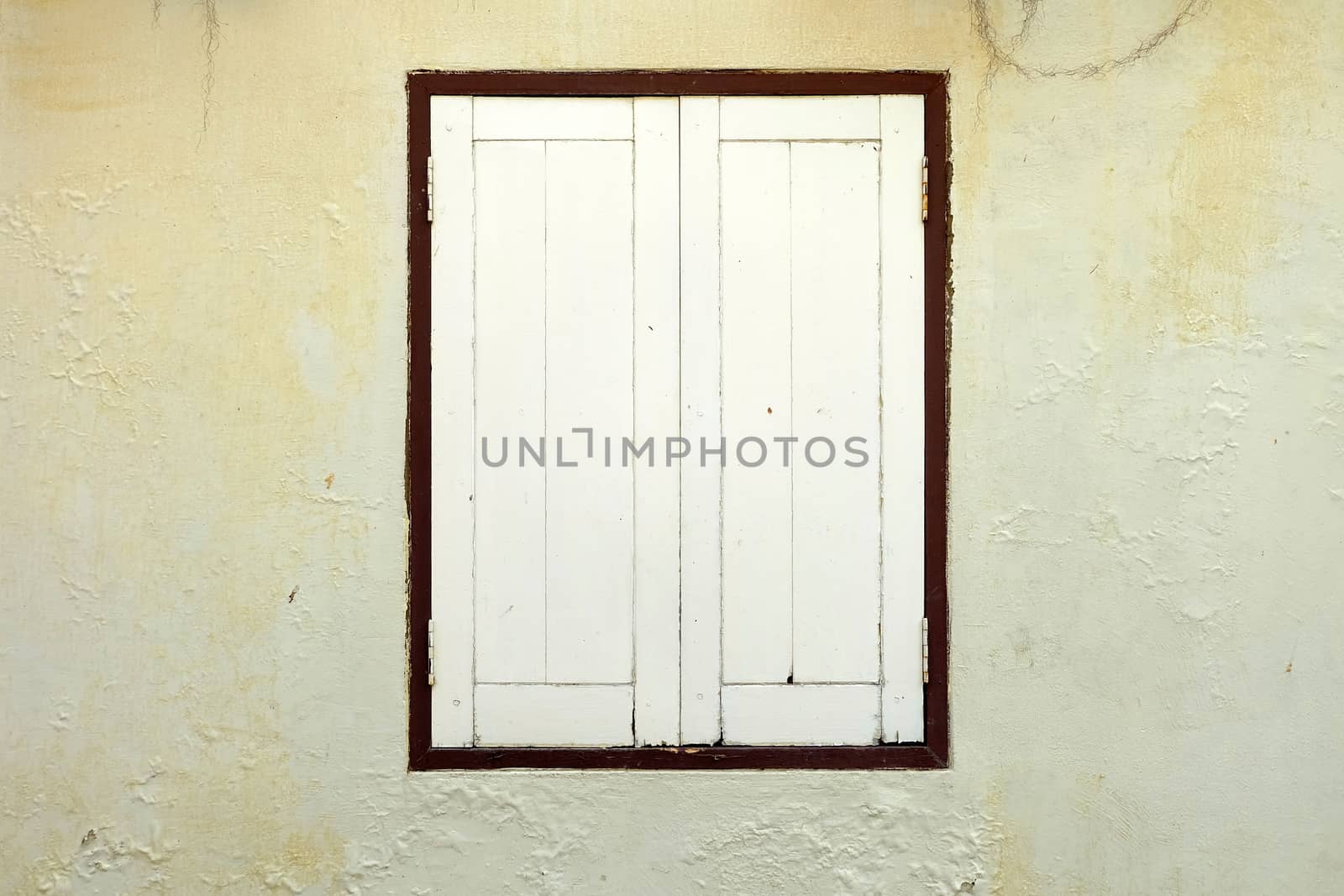 Old Window on Grunge Concrete Wall Background.