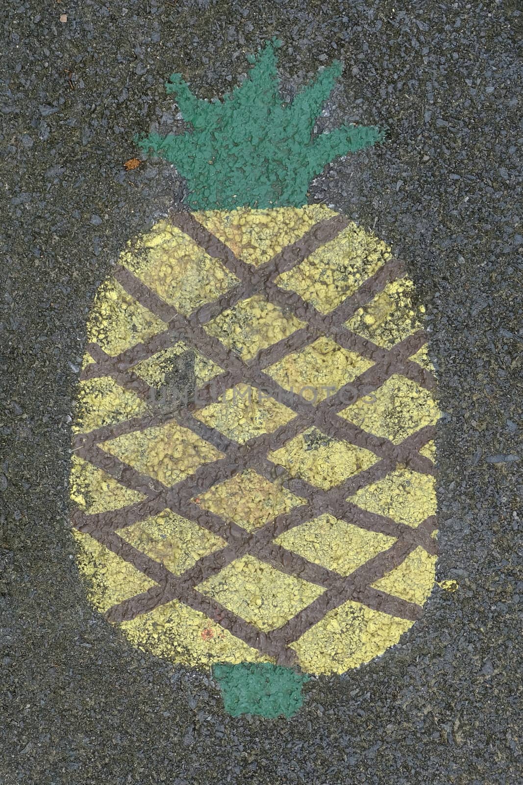 Pineapple Painting on Asphalt Ground.