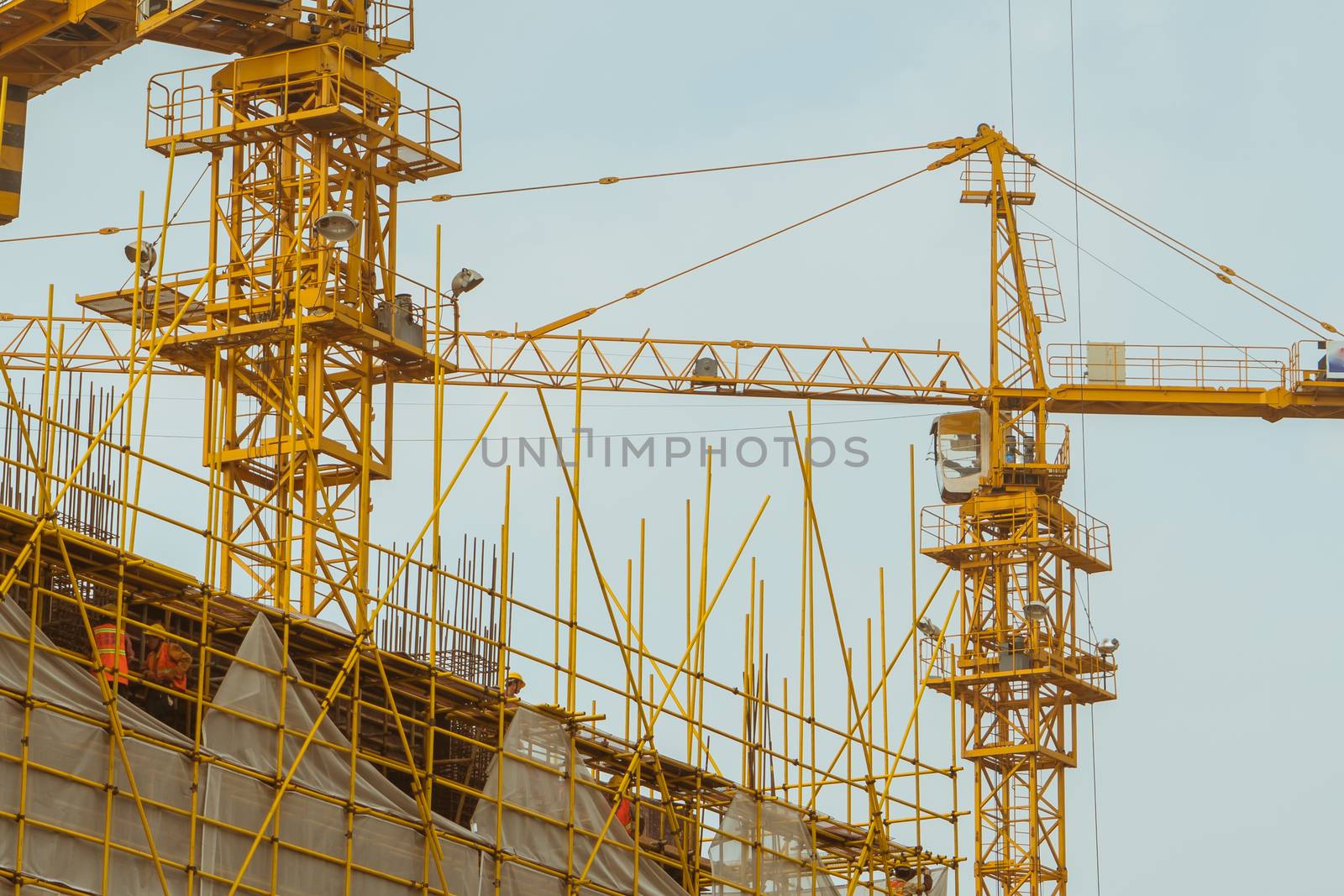 A crane is working on building construction site