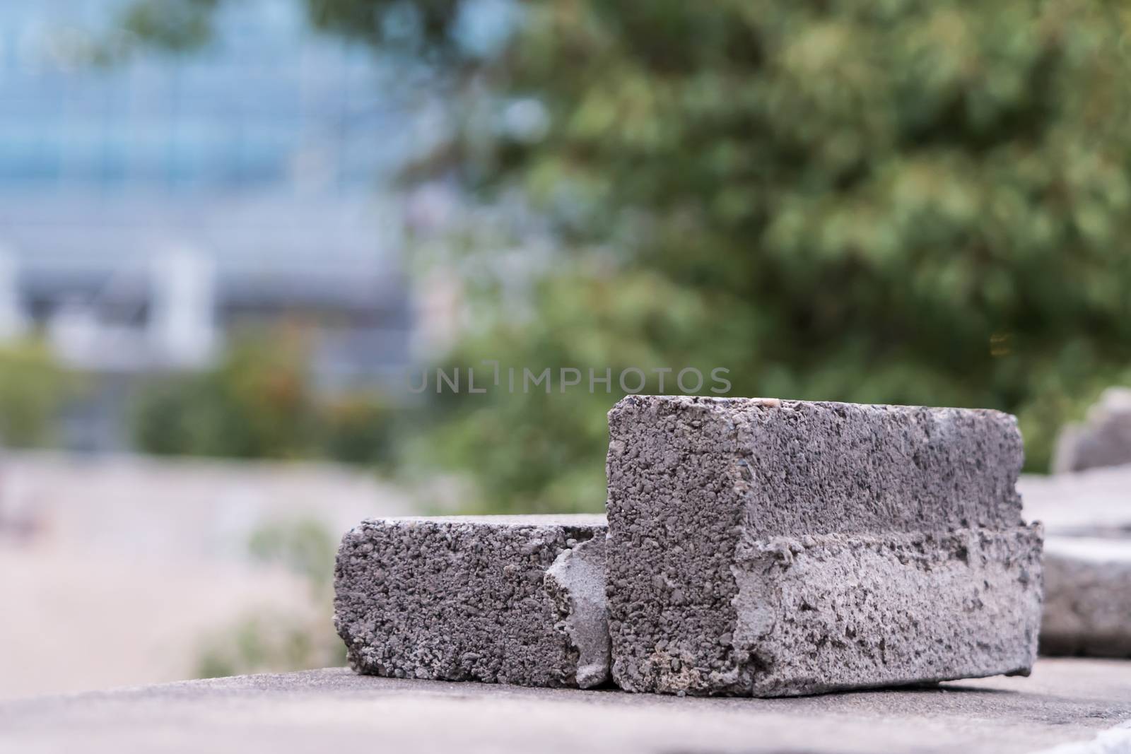 Broken brick on the wall - blurred background