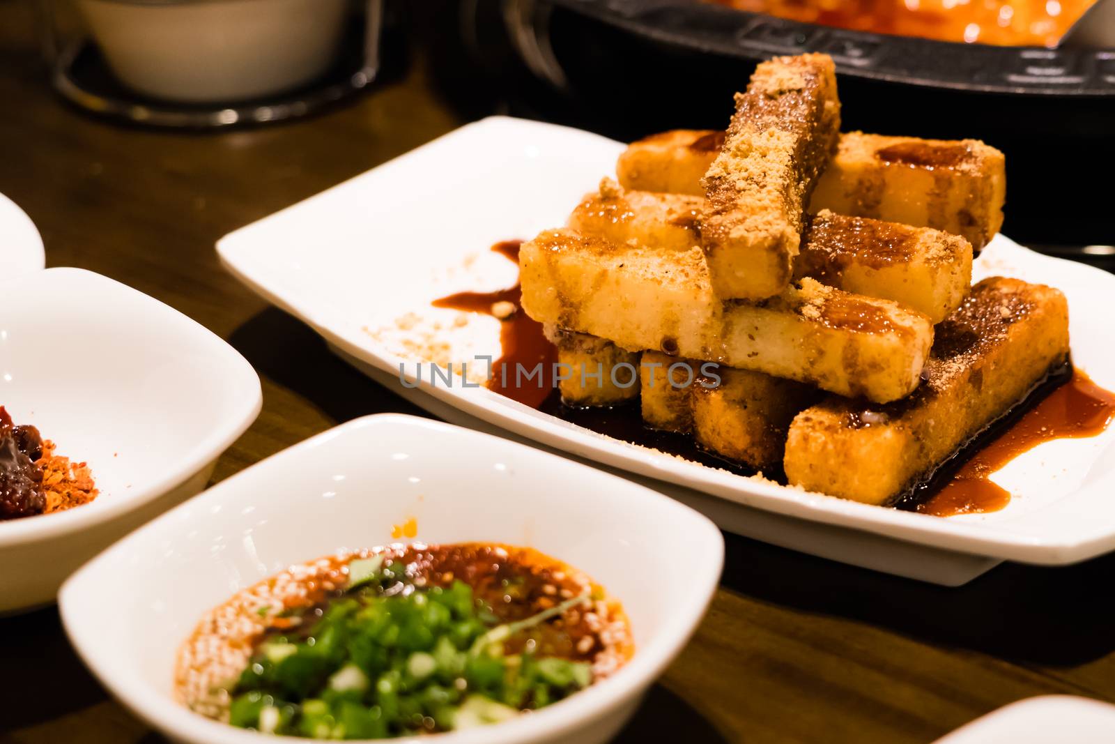 Chinese dessert - glutinous rice deep fried with caramel and crane sugar