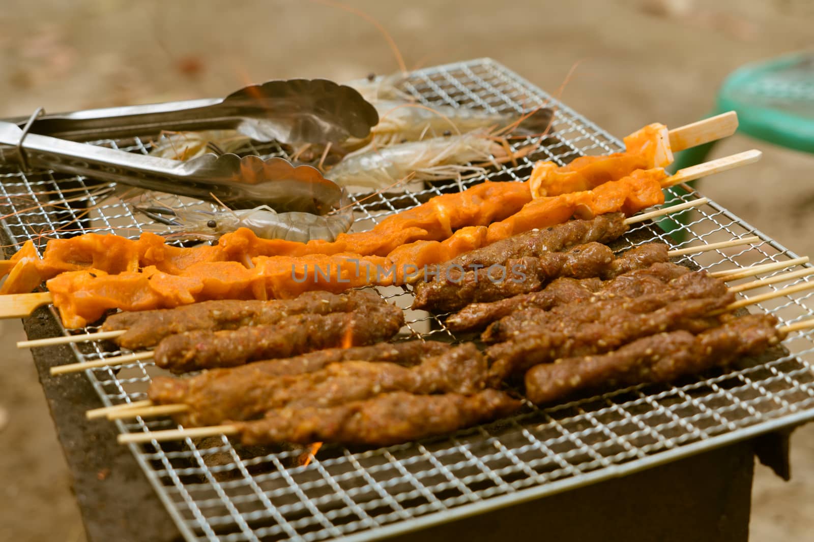 meat, chicken and shrimp barbecue on the charcoal toaster