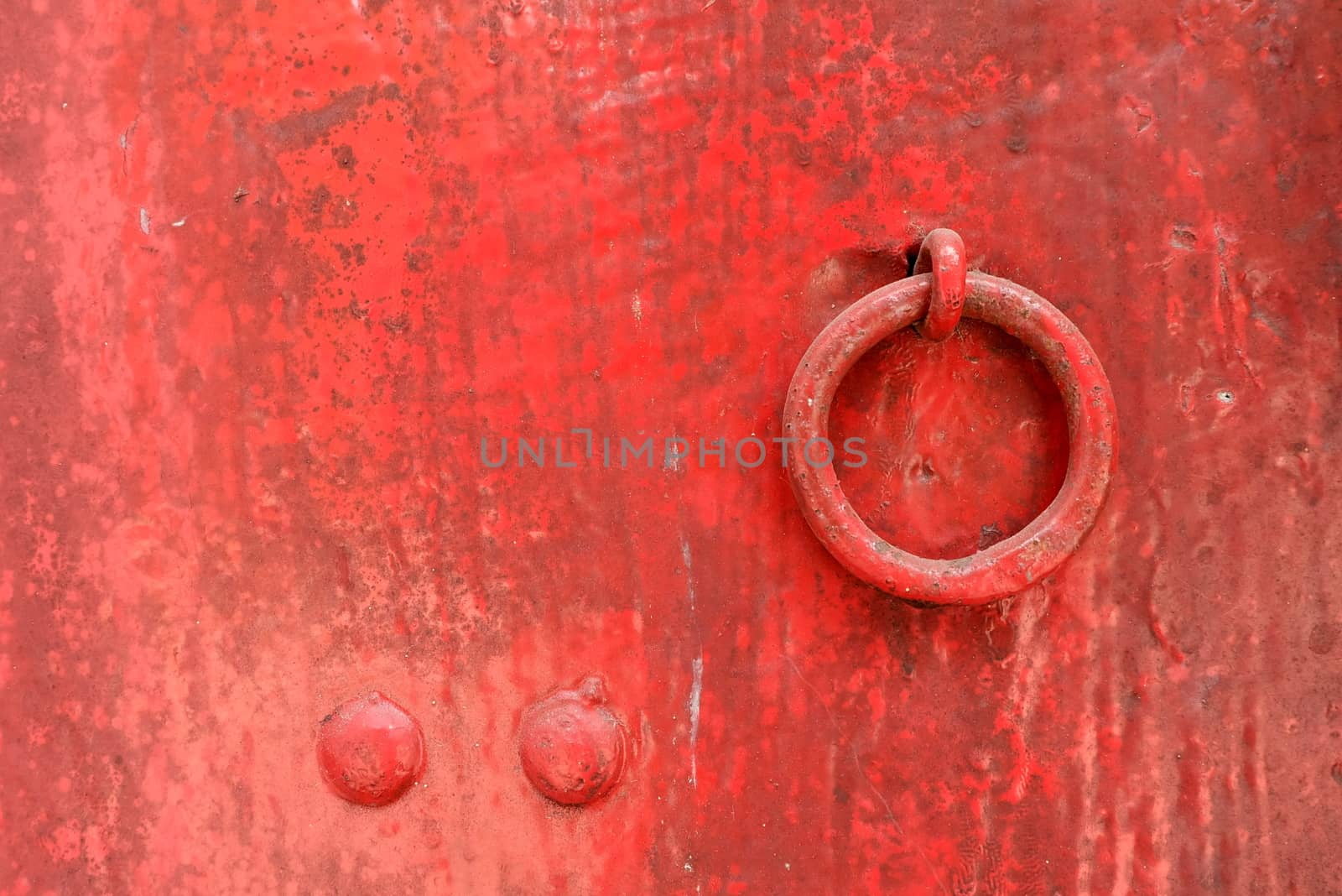 Old Metal Latch on Wood Red Door.