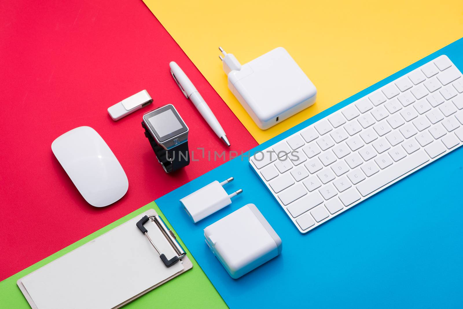Well organised white office objects on colorful background by makidotvn