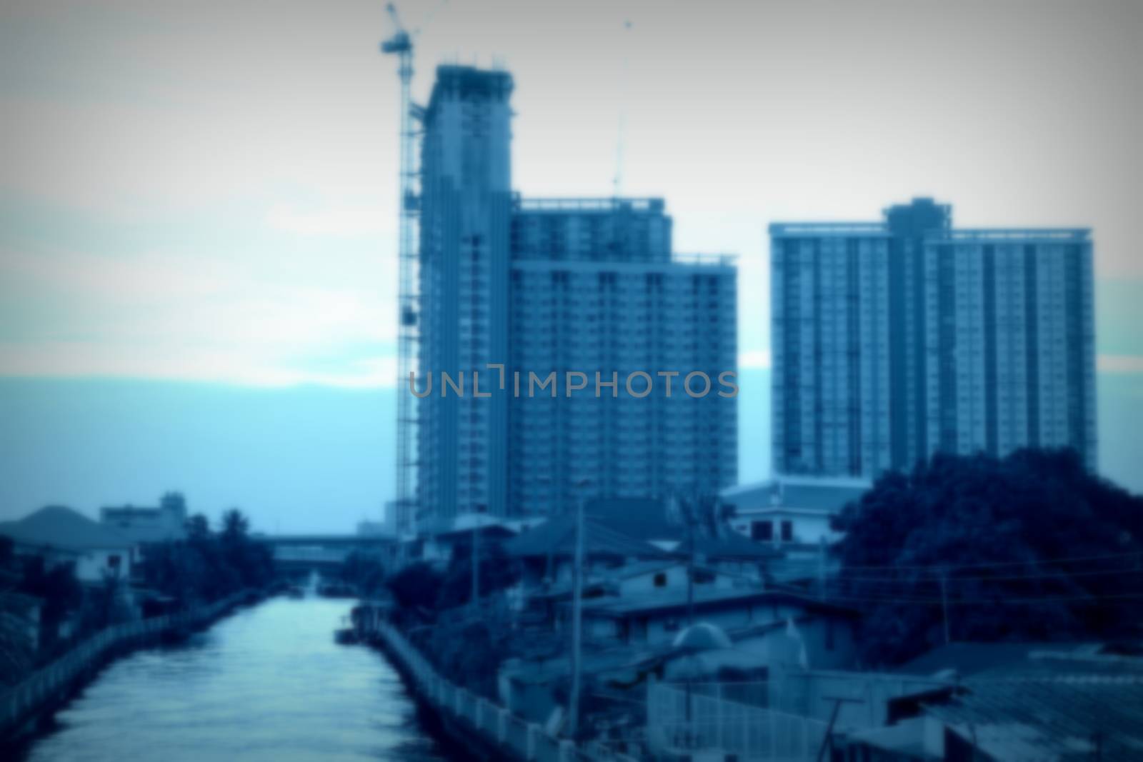 Blurred Scene of Pran Sricharoen Canal in Bangkok, Thailand with Blue Filter. by mesamong