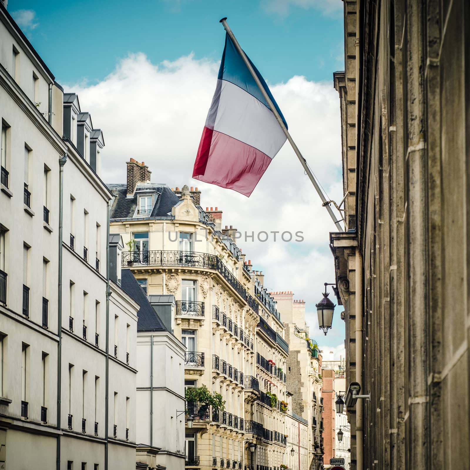 The French Flag Flying In A Residential Street In Paris