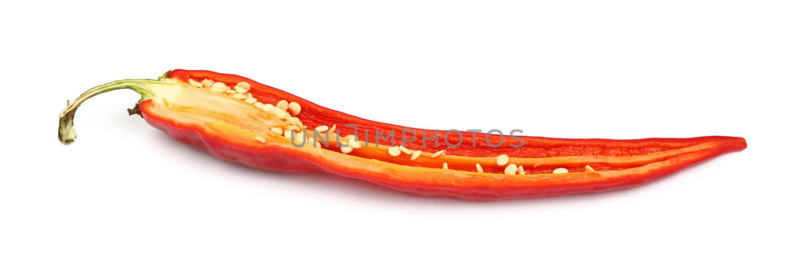 One cut half of fresh red hot chili pepper isolated on white background, close up, low angle view