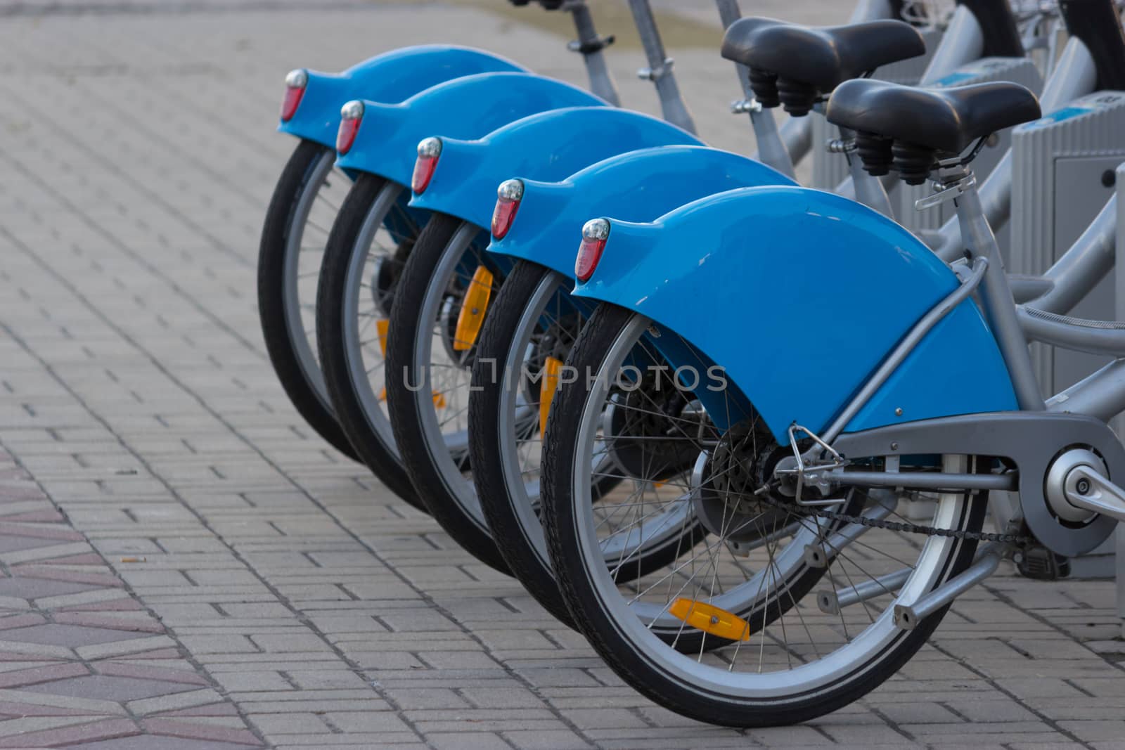 Silver blue bicycle at parking by liwei12