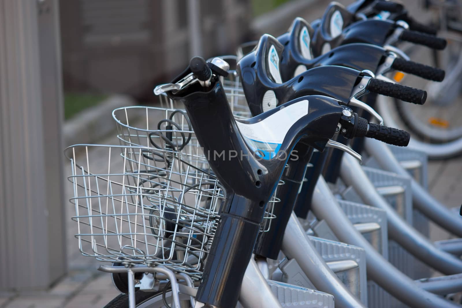 Silver blue bicycle at parking, bike rent
