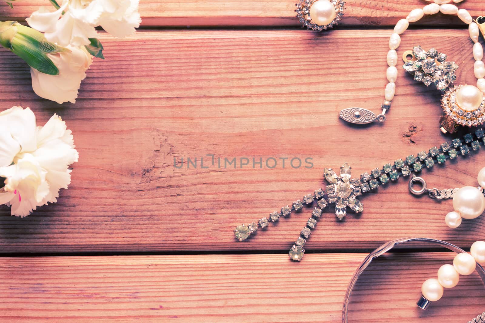 antique vintage silver jewellery on wooden table