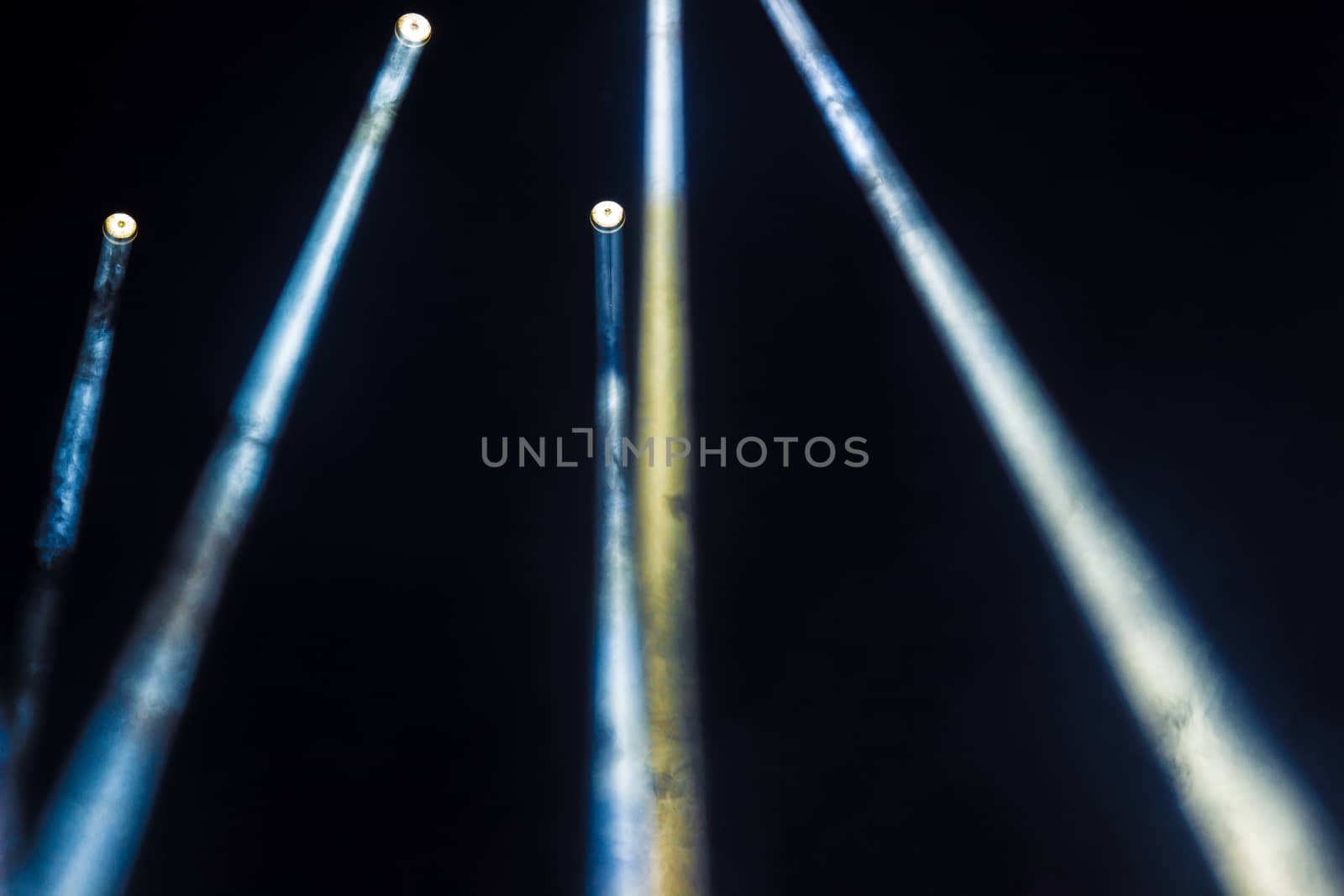 Colorful lights and smoke on a stage.