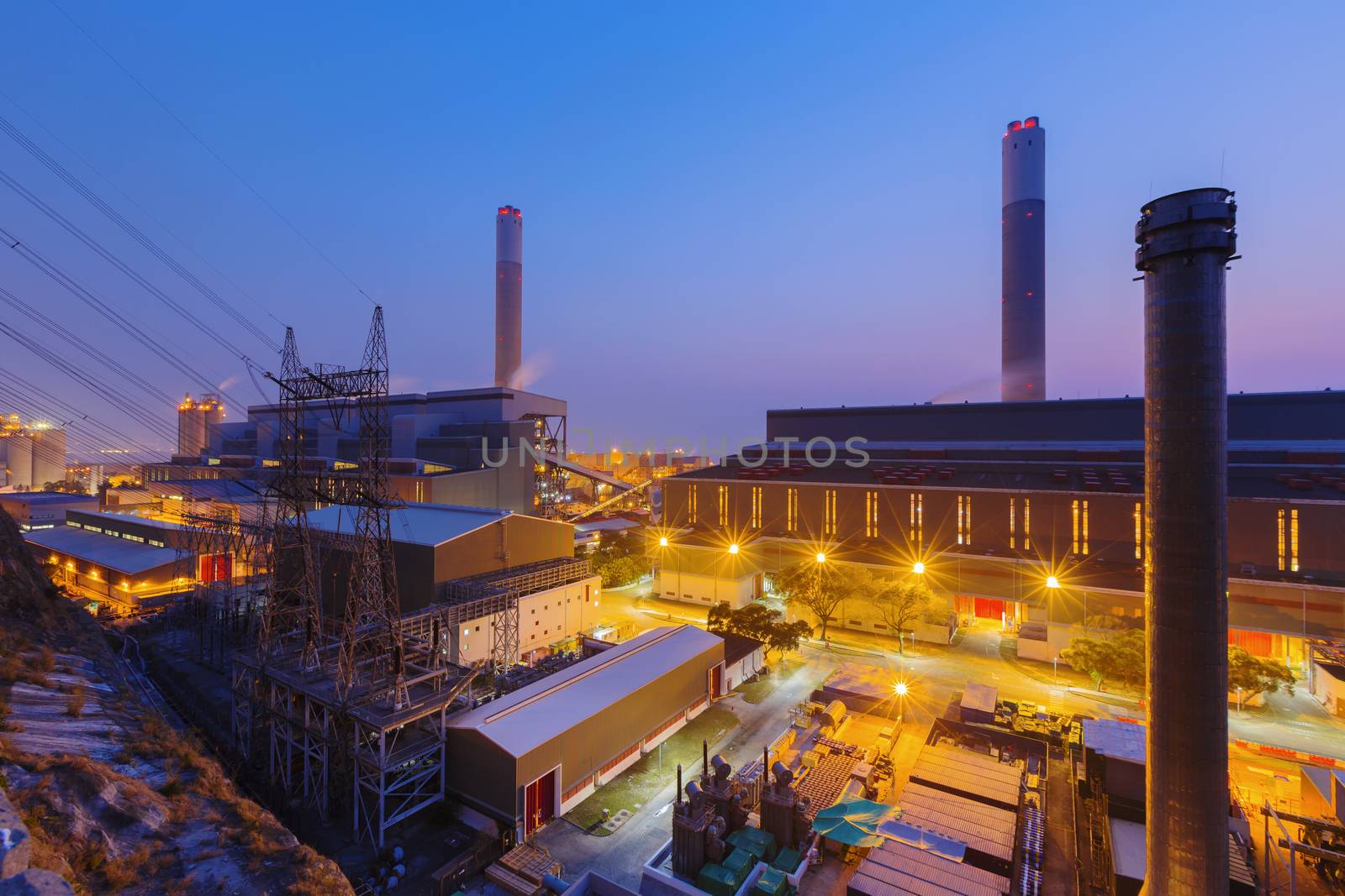 Hong Kong power station at sunset , Glow light of petrochemical industry