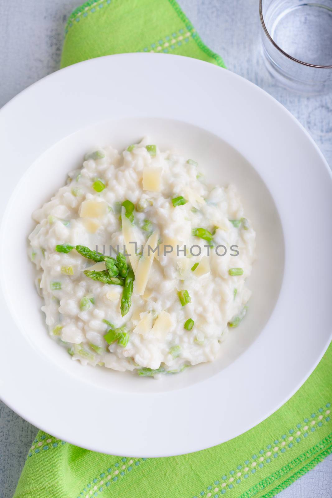 Risotto with Asparagus in a white plate by supercat67