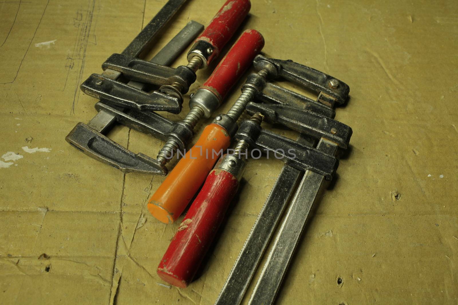 Used clamps, carpentry tools close to