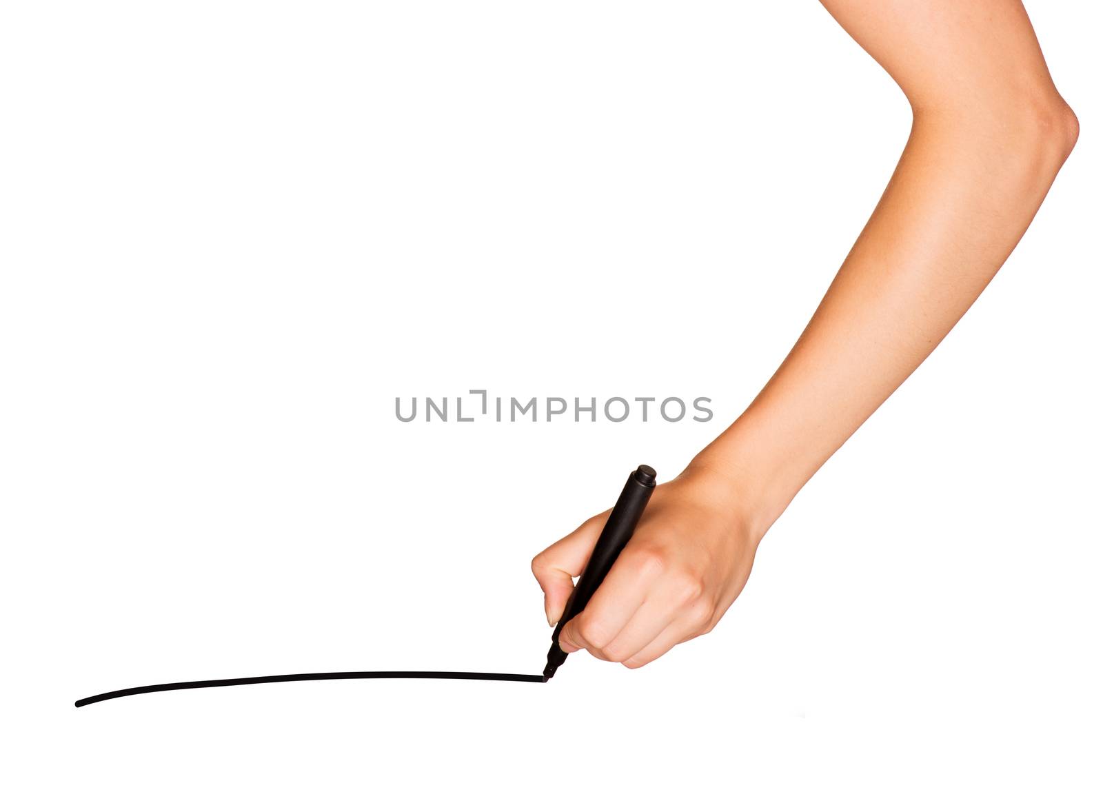 A female hand holds black marker and draws line. Isolated on white background