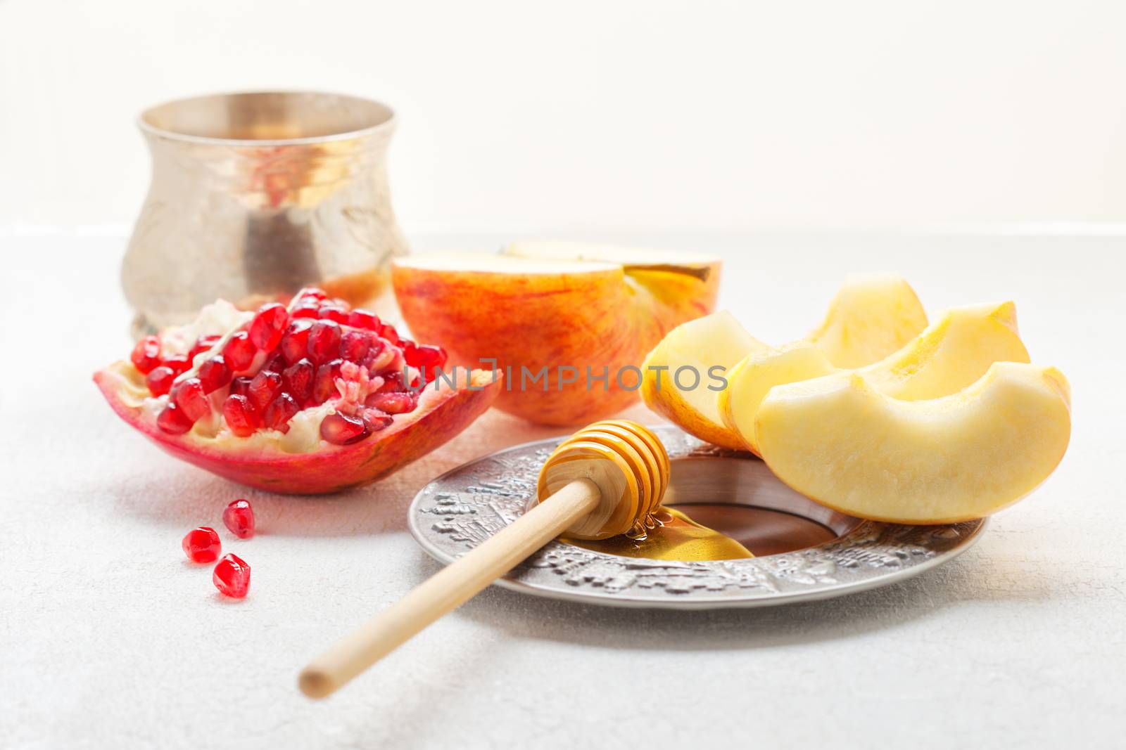 Apples, pomegranate and honey for Rosh Hashanah  by supercat67