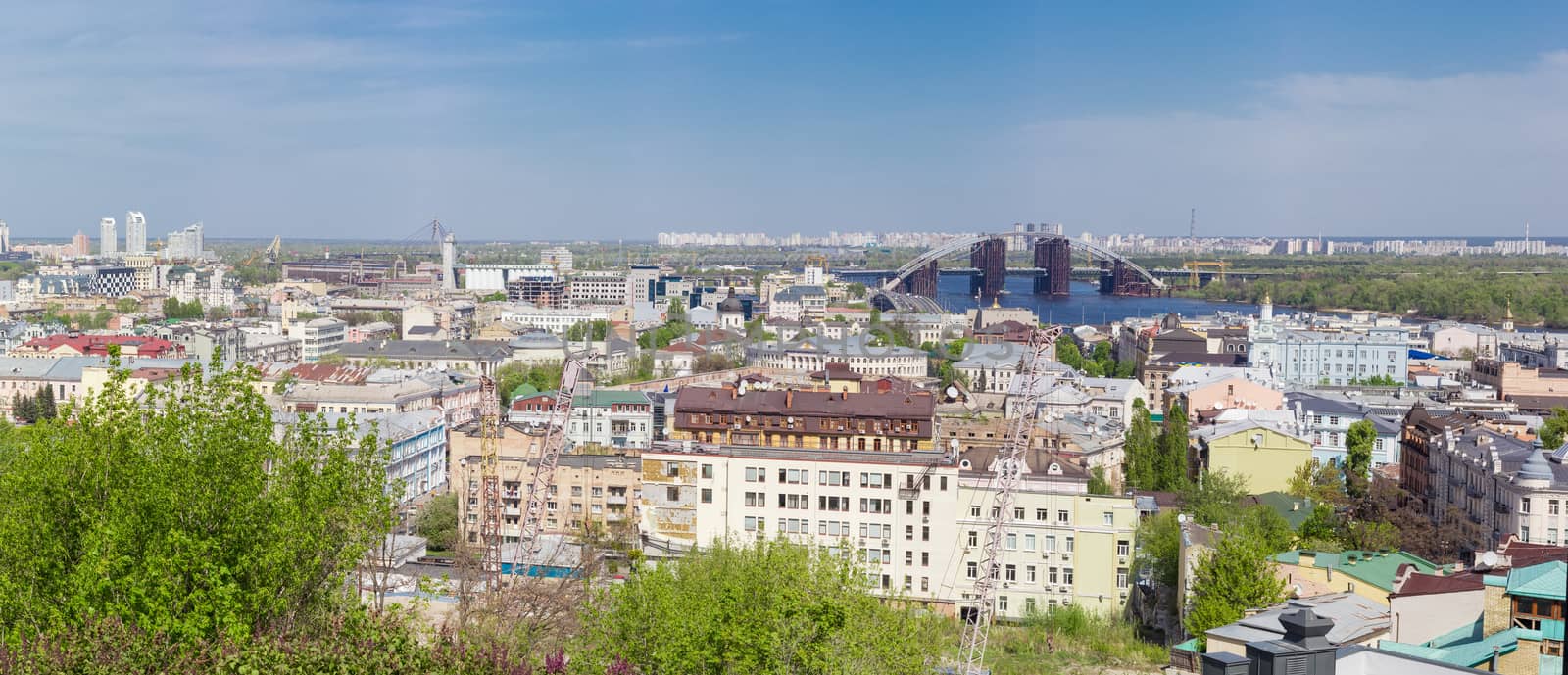 Panorama of the Podil - the historic neighborhood of Kiev from Castle Hill in springtime, Ukraine. 
