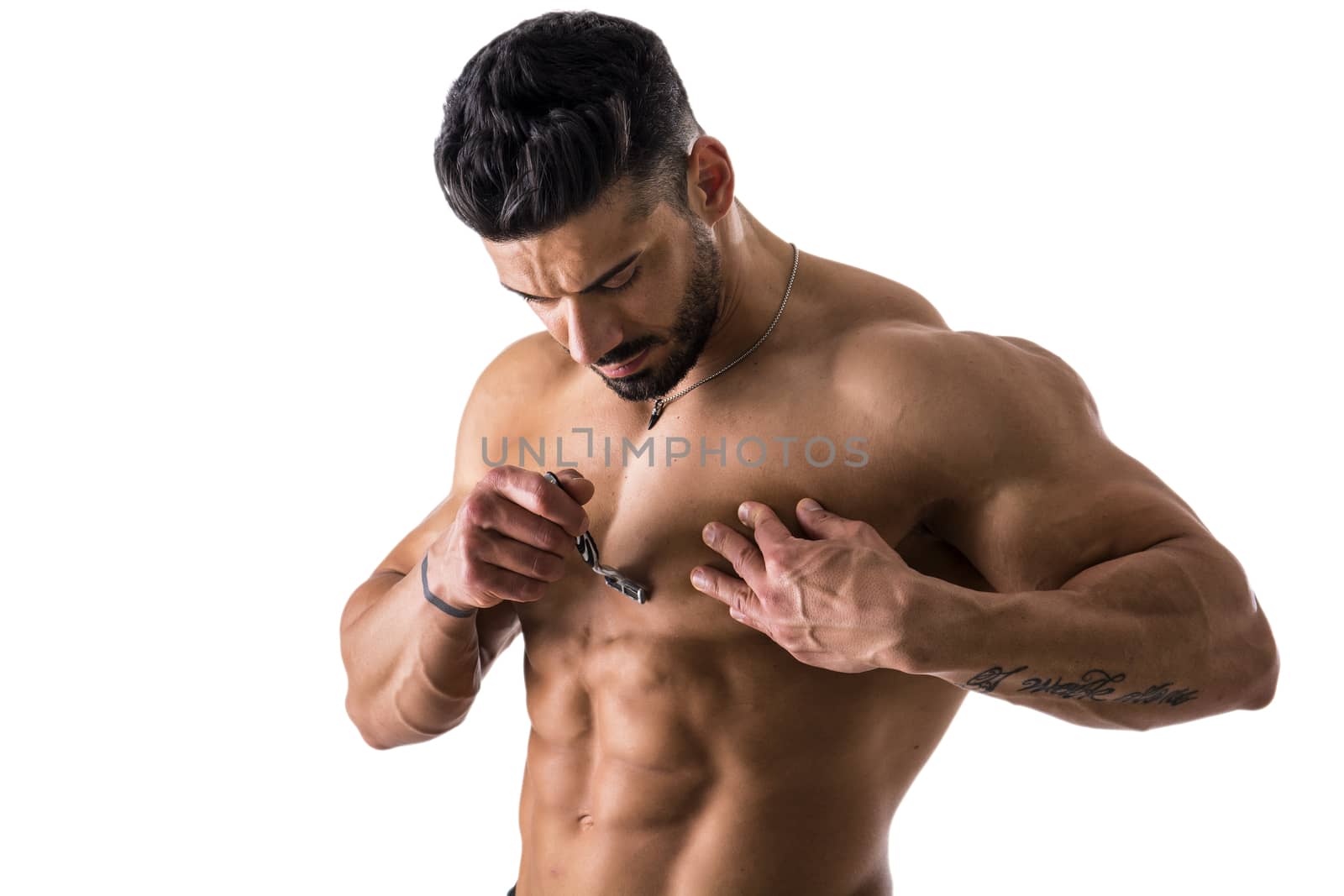 Close up Handsome Muscled Young Man Shaving his Chest with Manual Shaver, Isolated on White Background.