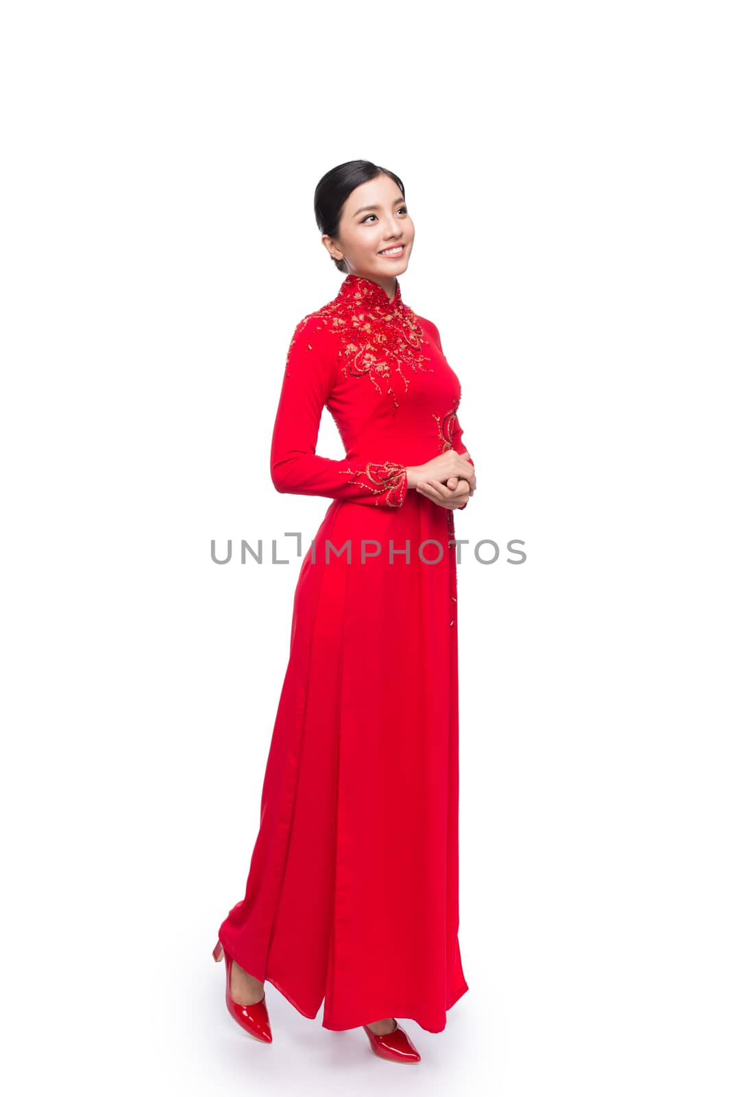 Full body of charming Vietnamese Woman in Ao Dai Traditional Dre by makidotvn
