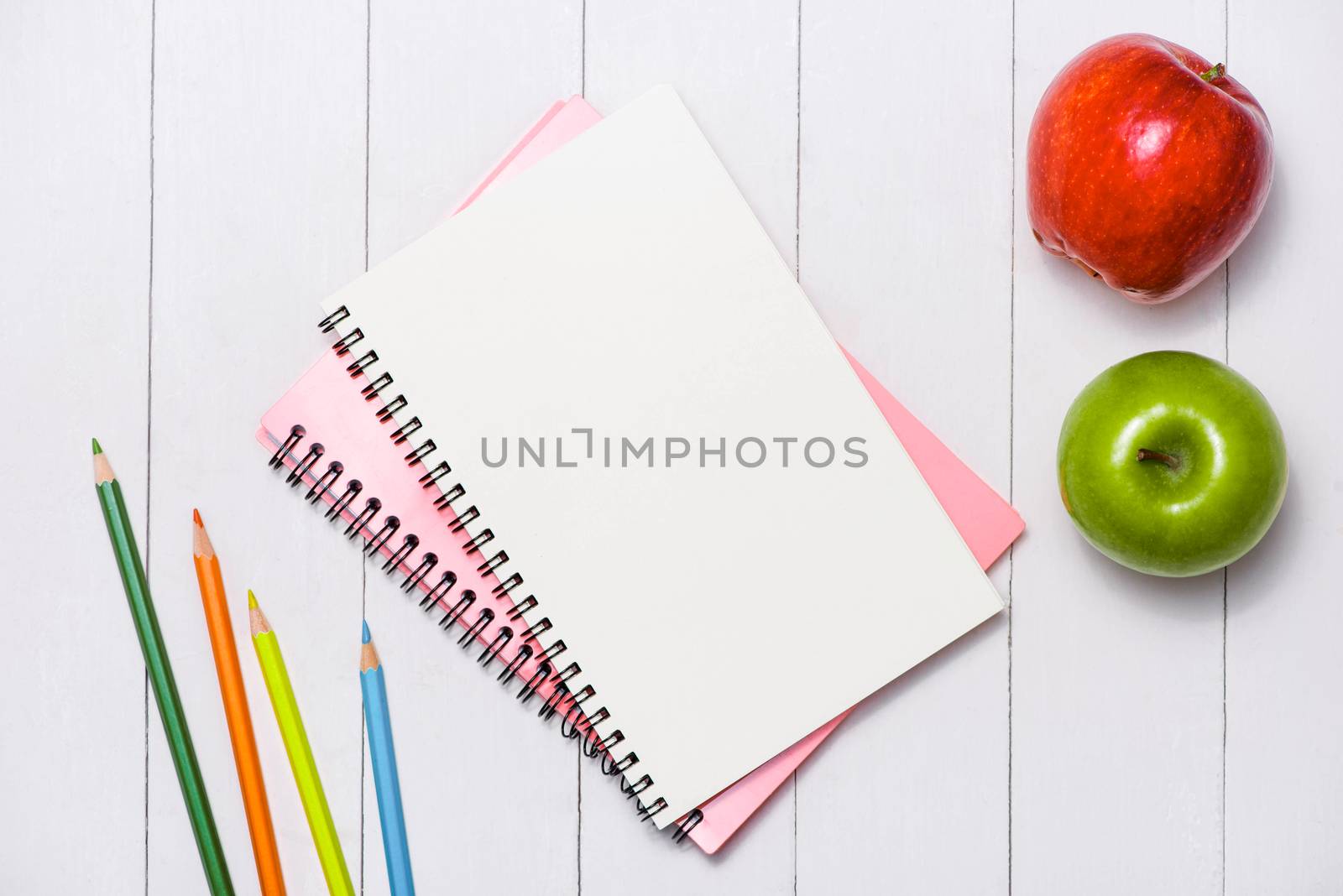 School stationery or office supplies on wood background. by makidotvn