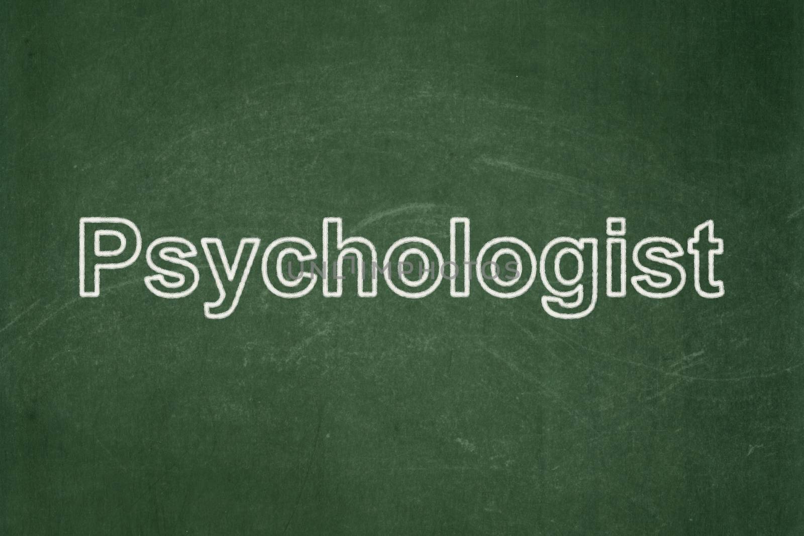 Medicine concept: Psychologist on chalkboard background by maxkabakov