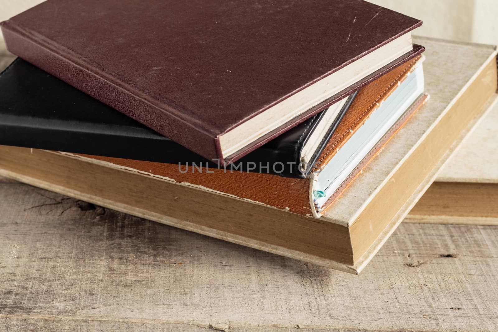 Old books and dusty on wooden floors.