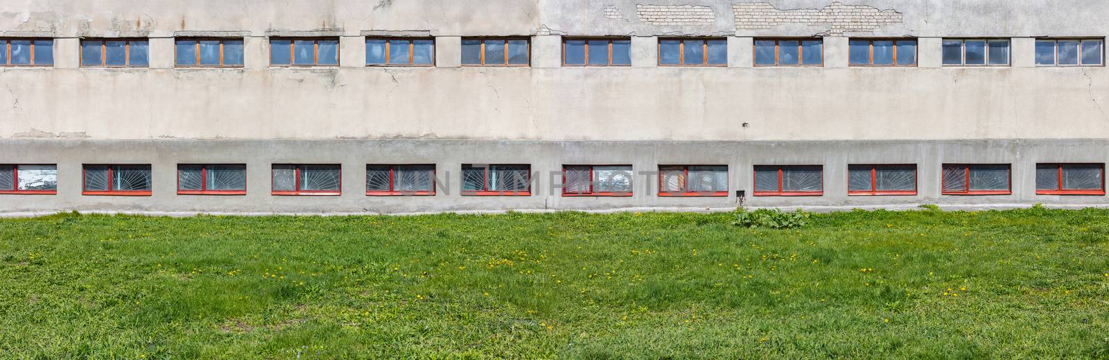 Abstract background, concrete building and grass