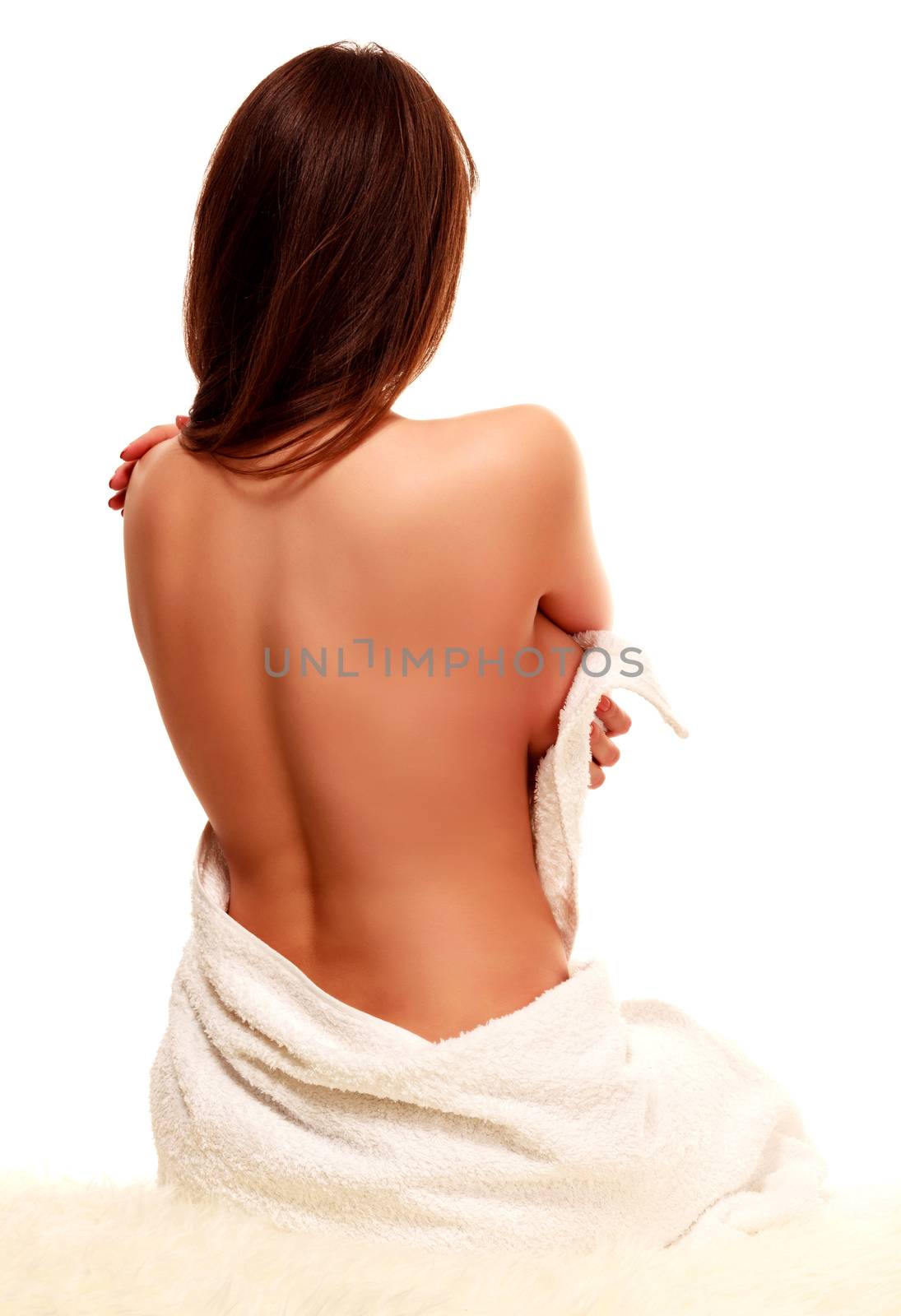 Woman in white towel, naked back, smooth skin, isolated on white background