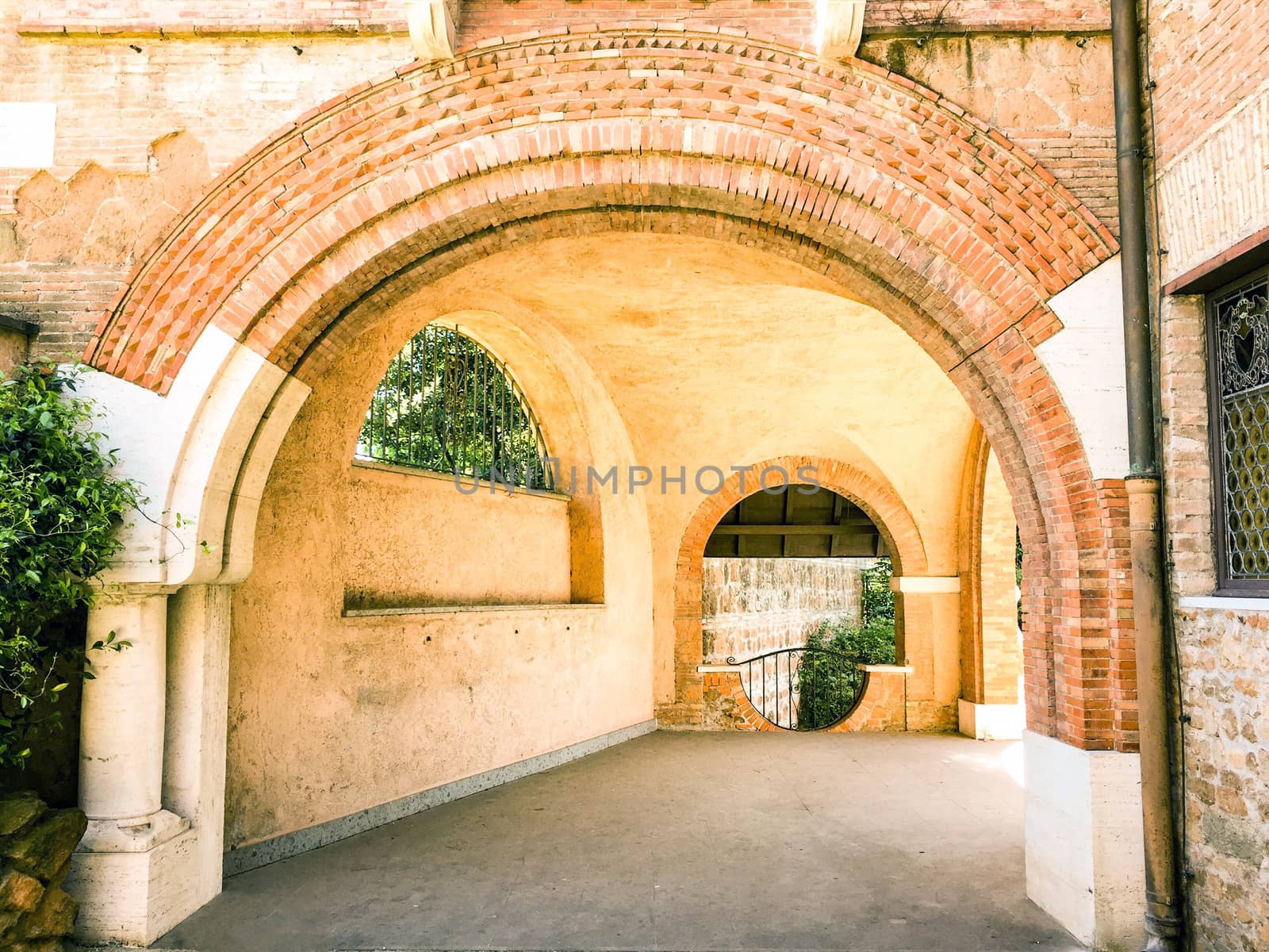 Ancient entrance of a historical building with multiple arches