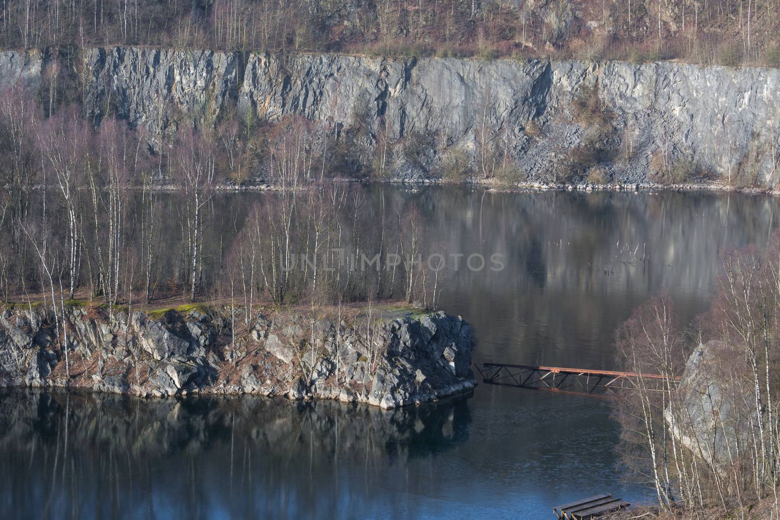 Panoramic view of an old open opencast mine of limestone works in Wuelfrath, Germany on a winter day.