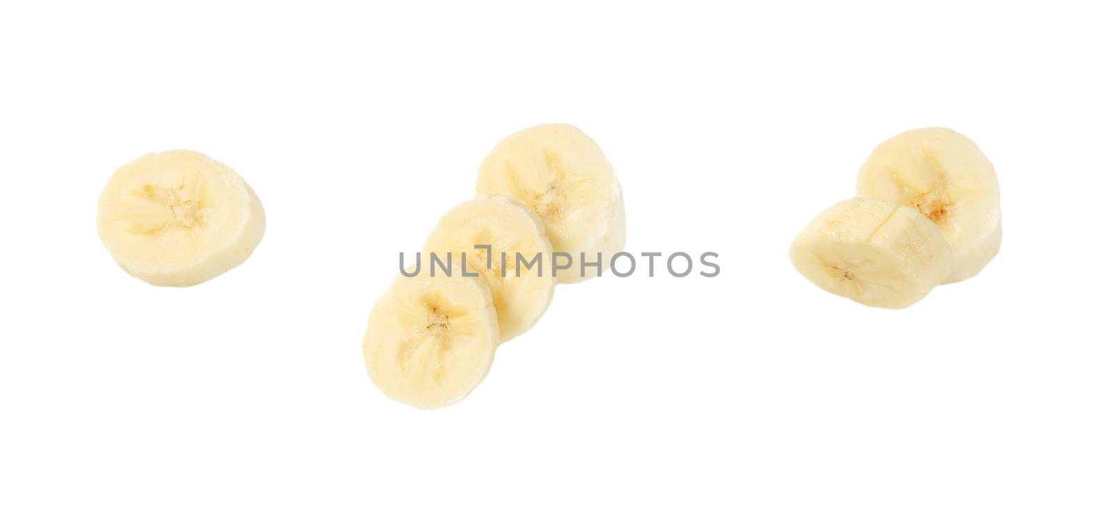 slices of banana on white background